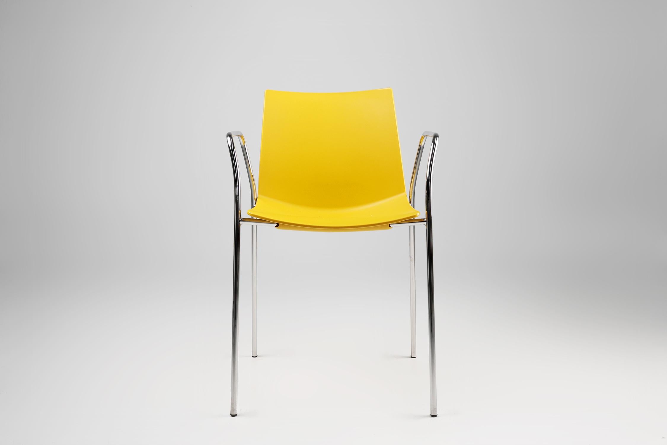 Belgium / 2000 / chair / plastic, metal / Mid-century / Design

A sleek yellow chair with metal frame and arm rests, designed in Belgium. This stylish and functional chair is an asset for both outside and inside and easy to mix with other chairs.