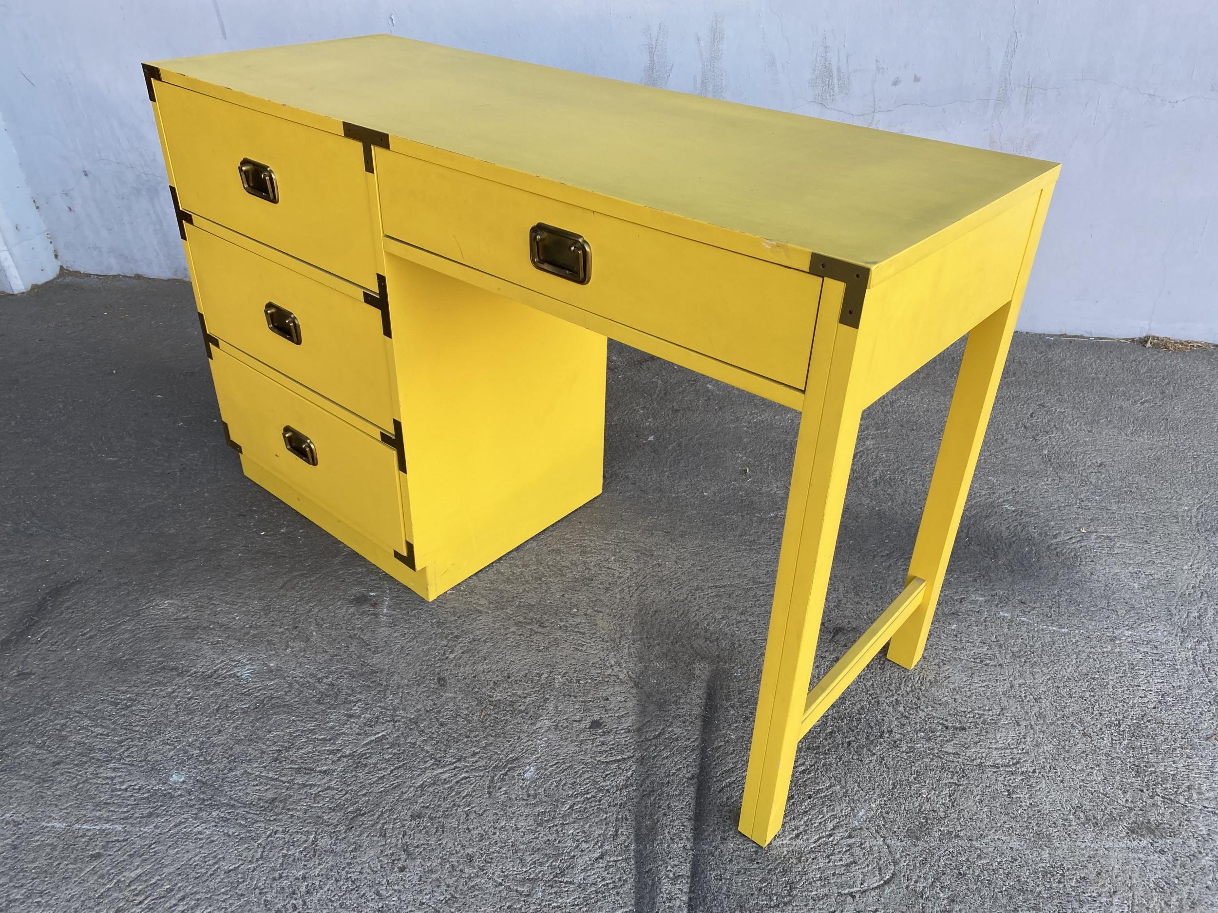 yellow desk with drawers