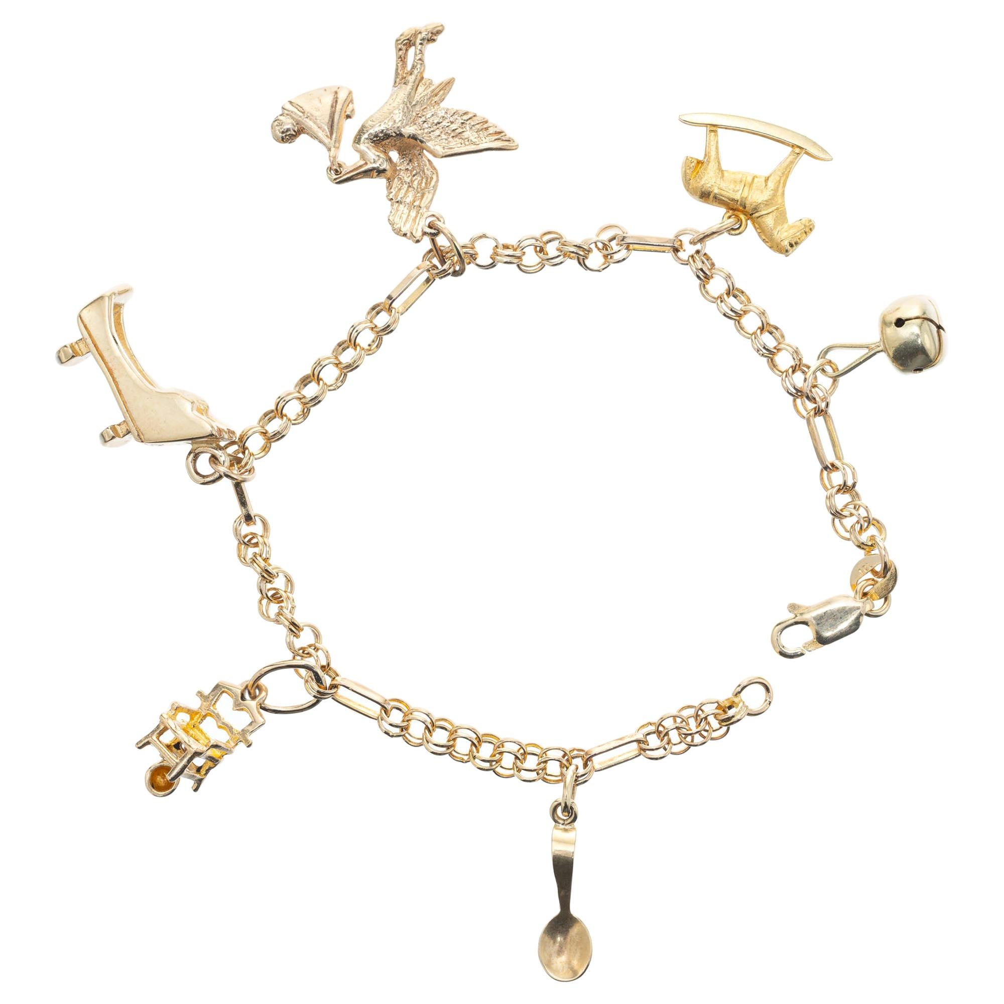 Mid-Century Yellow Gold Baby Themed Link Charm Bracelet For Sale
