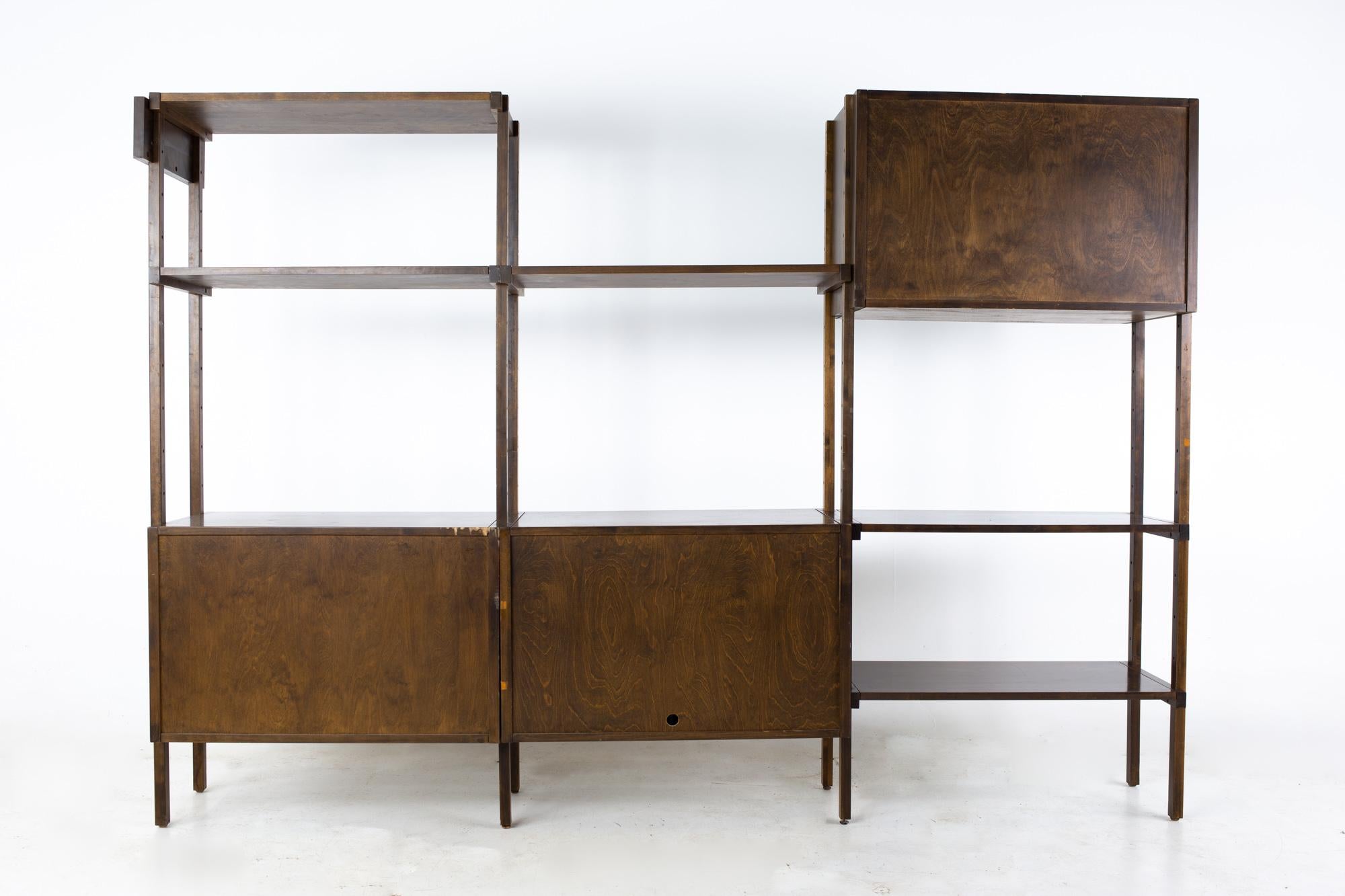 Mid Century Yugoslavian walnut 3 bay wall unit

The wall unit measures: 98.25 wide x 18 deep x 69 inches high

All pieces of furniture can be had in what we call restored vintage condition. That means the piece is restored upon purchase so it’s