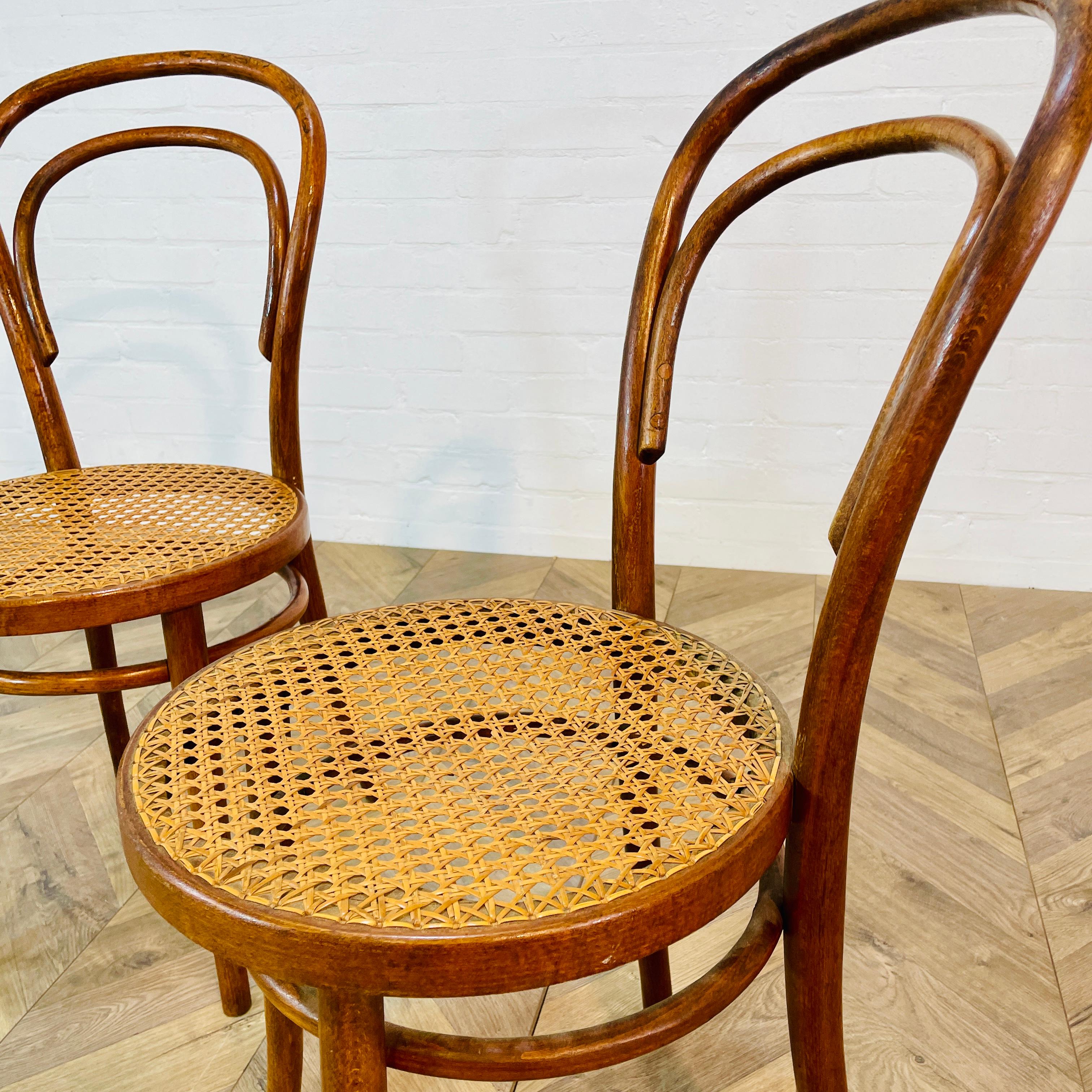 A Pair of Vintage Mid-Century ZPM Radomsko Bentwood & Cane Chairs, circa 1950s.

The chairs made by Polish furniture maker Radomsko ZMG, famed for also making Thonet chairs (same factory) are in a good vintage condition with only small marks and