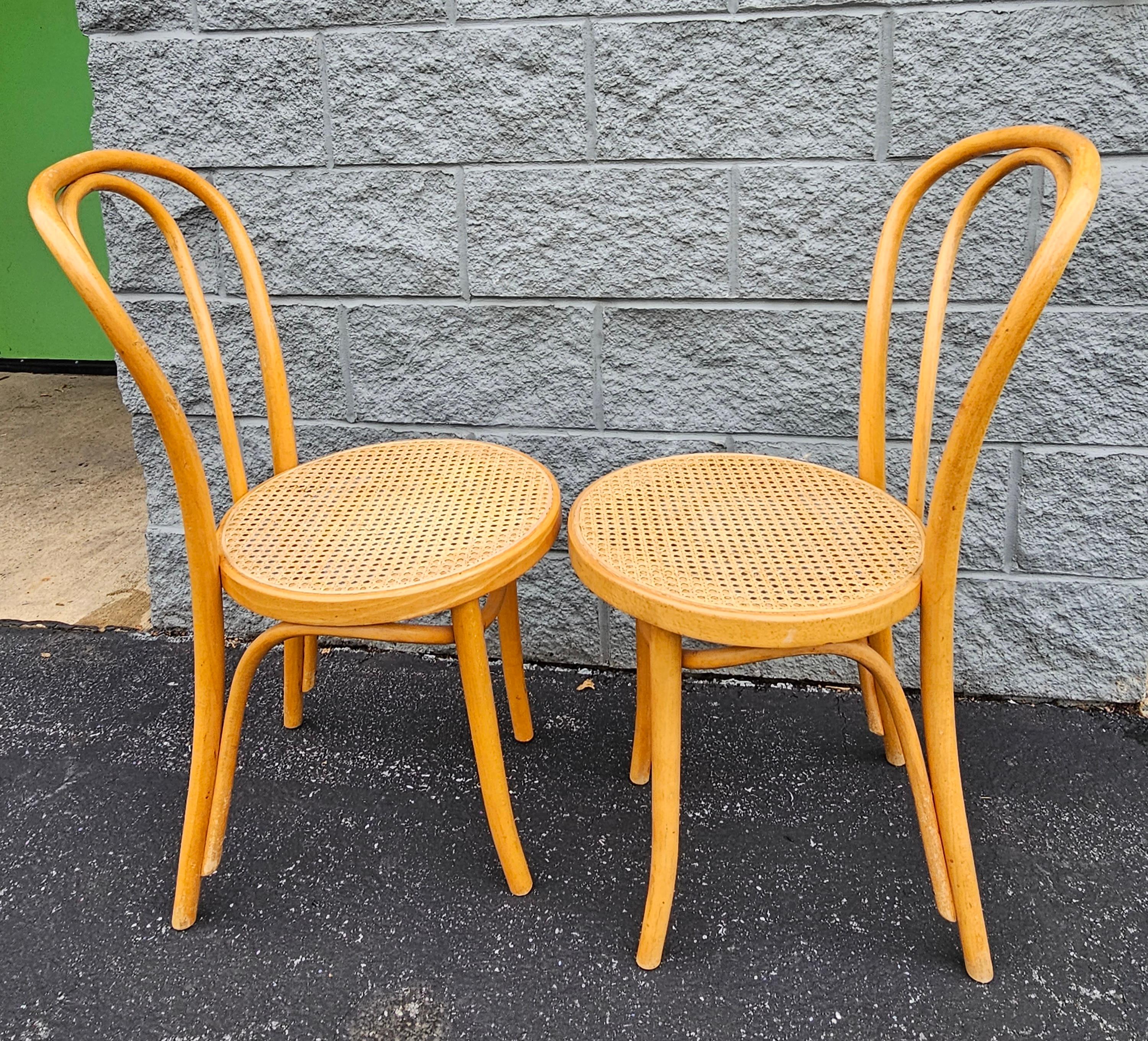 A pair of Mid-Century ZPM Radomsko Polish Bentwood Bistro Style Side Chairs. Measures 16
