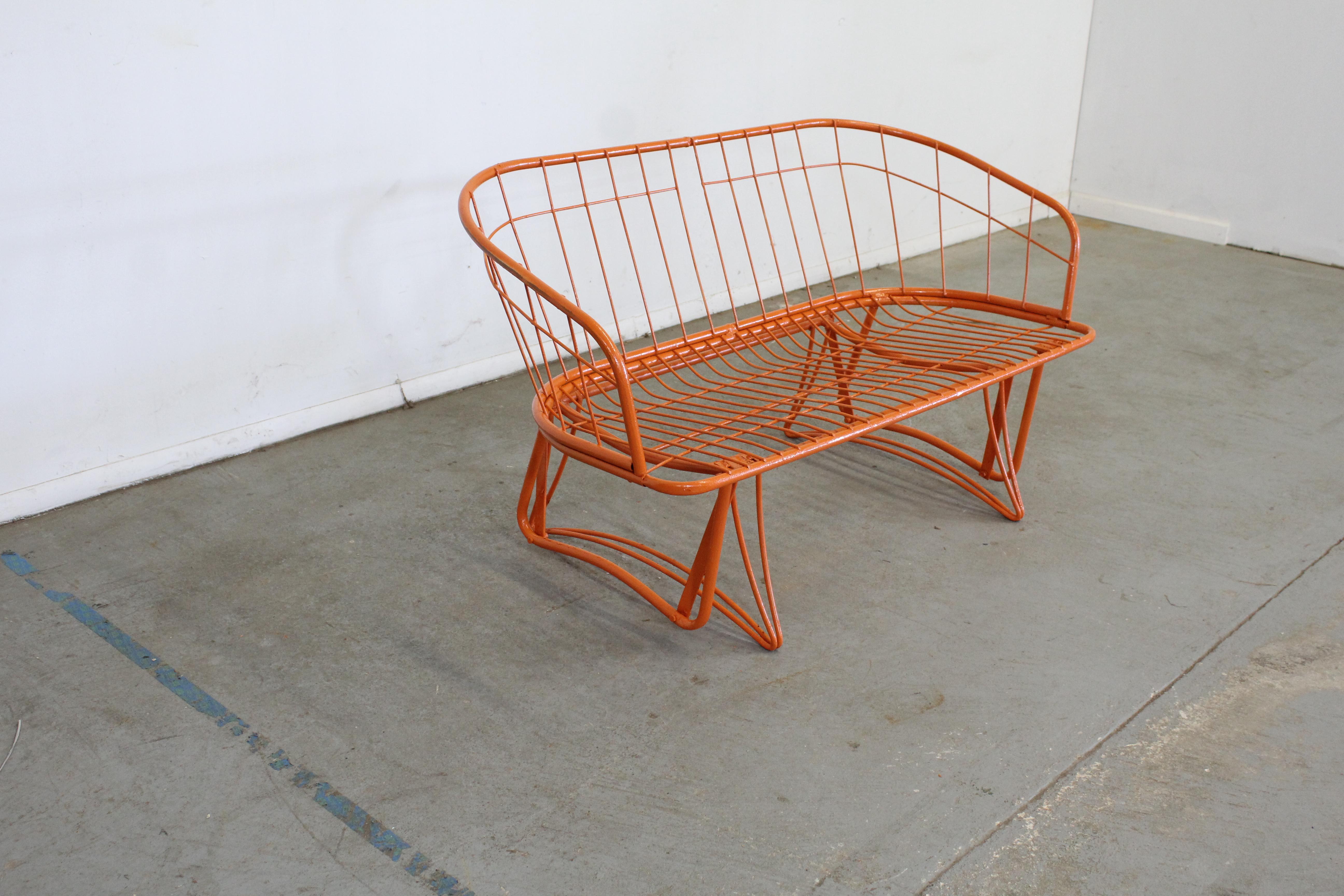Mid-Century Modern atomic orange Homecrest outdoor metal curved back glider bench
Offered is a Mid-Century Modern atomic orange Homecrest outdoor metal curved back glider bench, circa 1960's. This bench has been repainted in an atomic orange. It is