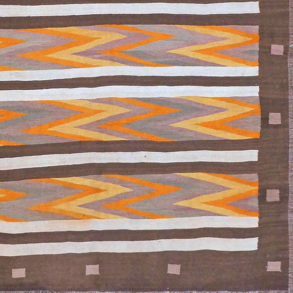 Mid-end 20th century handwoven woolen Traditional Asian Kilim carpet

This Kilim was made in central Anatolia and is inextricably linked to diverse and varied symbols that were woven into them. Every time and every region has its own distinctive