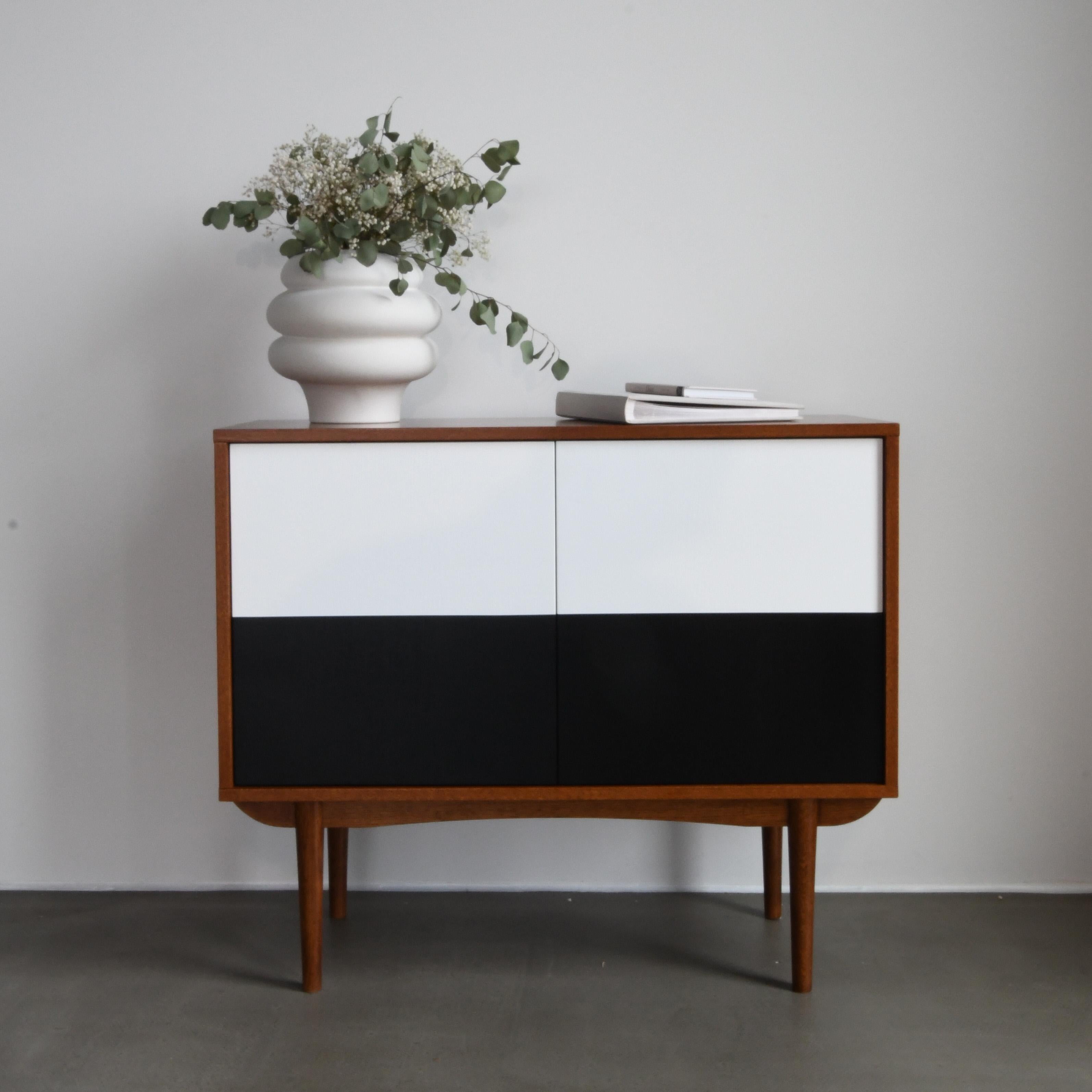 Mid Lane Medium Cabinet by Pastform
Dimensions: D 40 x W 100 x H 85 cm.
Materials: Stained and varnished wood.

Available in different wood color finishes: BPA, Nobel, Brandy, Whiskey, Rum, Natura, and Schwartz. Available in three different widths: