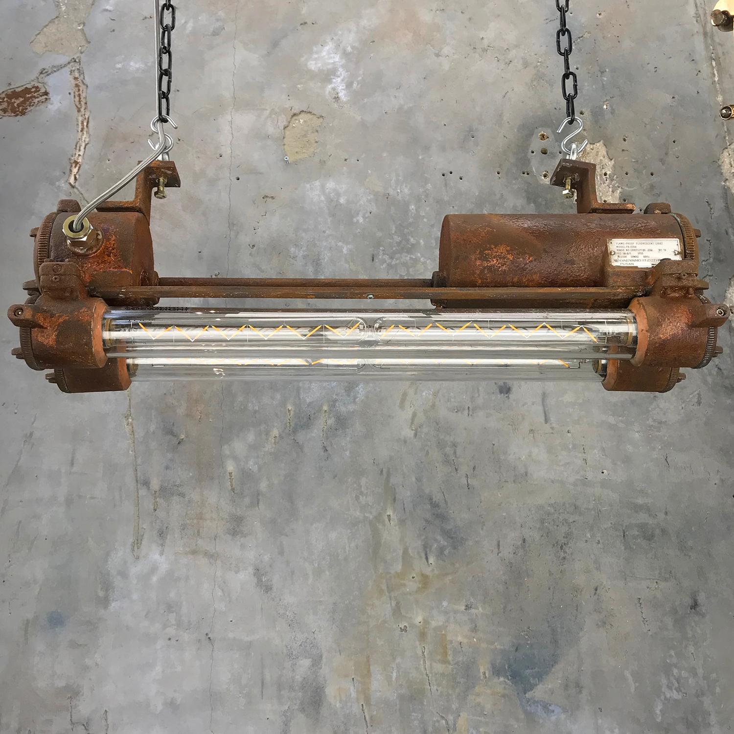 A reclaimed vintage industrial flameproof Edison tube light made by Daeyang circa 1978 with iron based rust applied finish. These fixtures are salvaged from decommissioned supertankers and military vessels then professionally restored in the UK