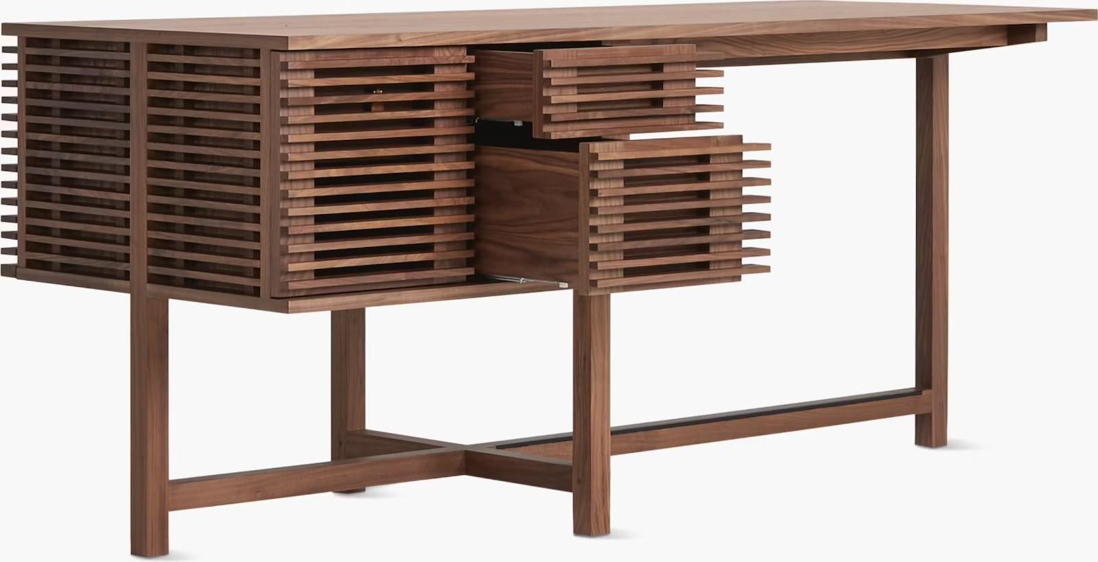 A Nathan Young for Design Within Reach Walnut Line Storage Desk. This is a gorgeous contemporary piece from DWR with mid century modern design inspiration. This piece features a very minimalistic design, with very functional features. This piece