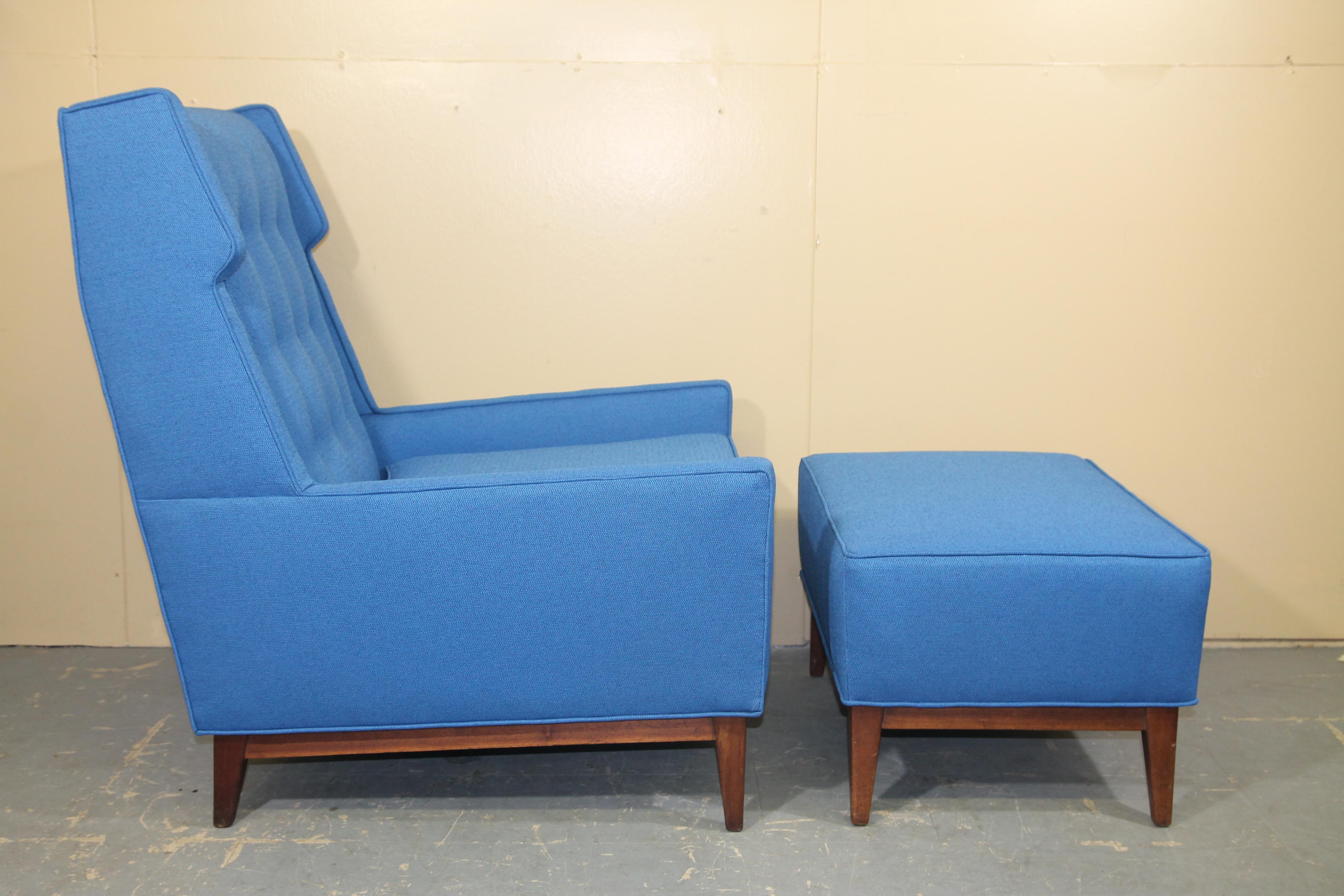 Wonderful midcentury wing back chair and ottoman. Unsure of the designer but looks like a cross between Risom and Dunbar. Chair and ottoman both have been redone in a blue Maharam fabric. Both pieces have walnut legs and frame.
Chair size: 29.5 x