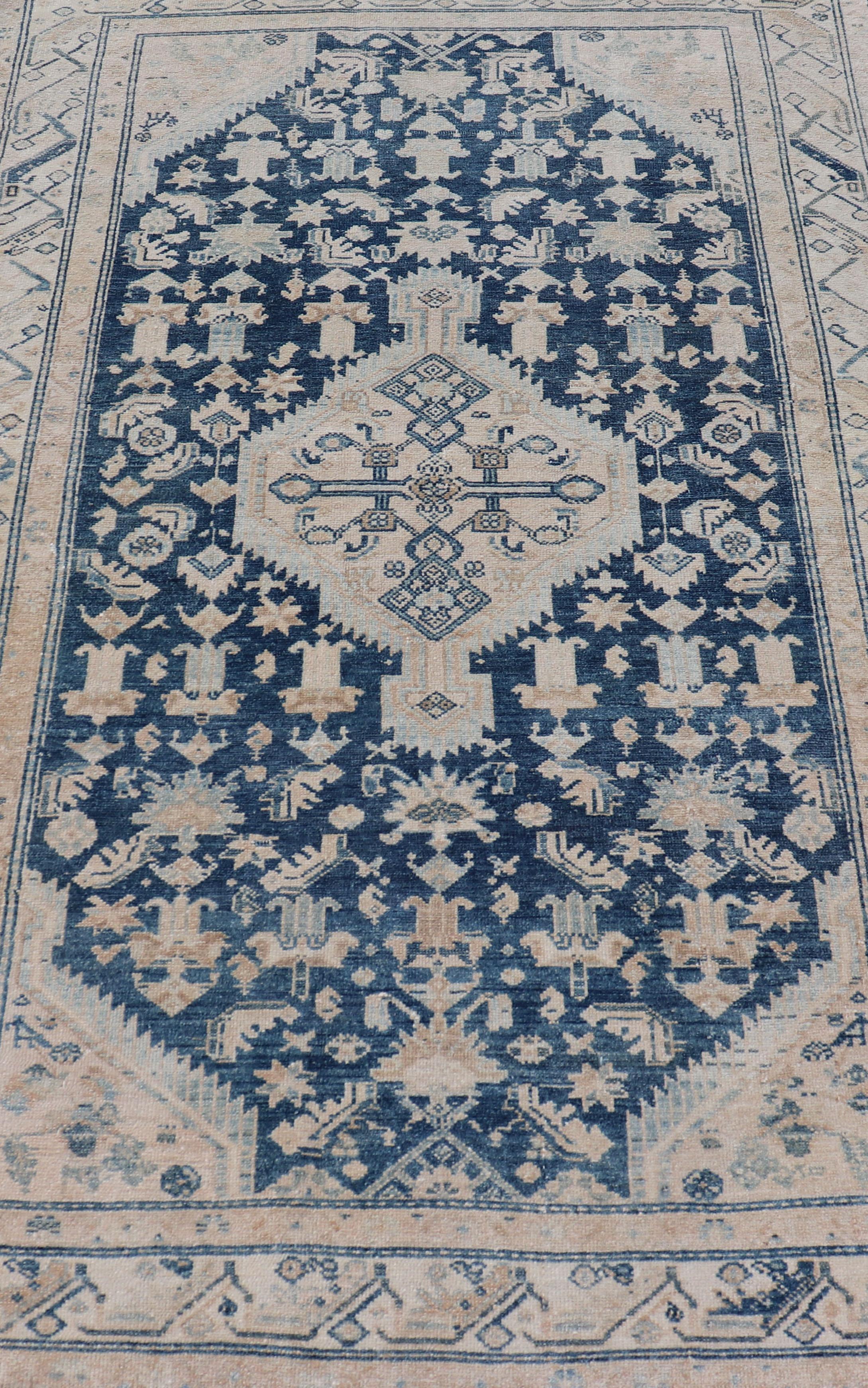 Mid night blue color rug, Blue Medallion Antique Persian Hamadan rug in dark Blue, Light Blue, and Cream. Keivan Woven Arts / rug VAS-55541, country of origin / type: Iran / Hamadan, circa 1920.

Measures: 4'5 x 6'11 

This Persian antique
