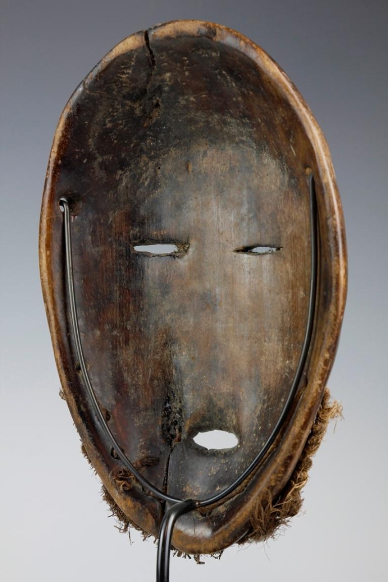 Carved Mid-Twentieth Century 'Idimu' Mask For Sale