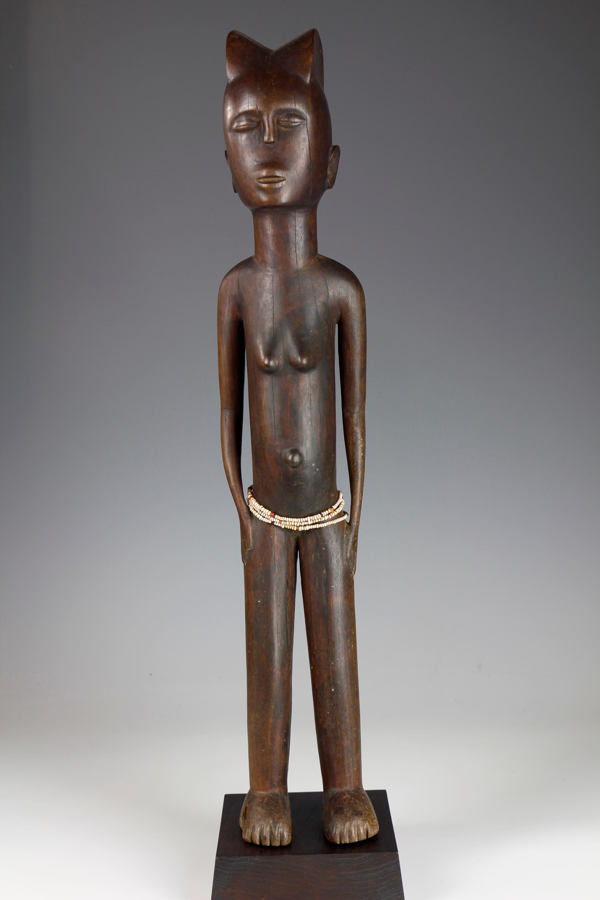 Tribal Mid-Twentieth Century Tall Female Figure With Bead Decoration For Sale