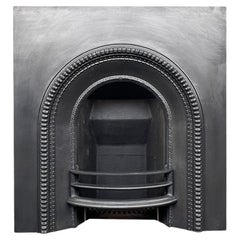 Mid Victorian cast iron arched fireplace insert