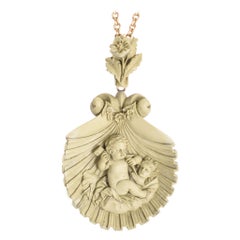 Mid-Victorian "Cupid Carving Aphrodite" Lava Cameo Pendant
