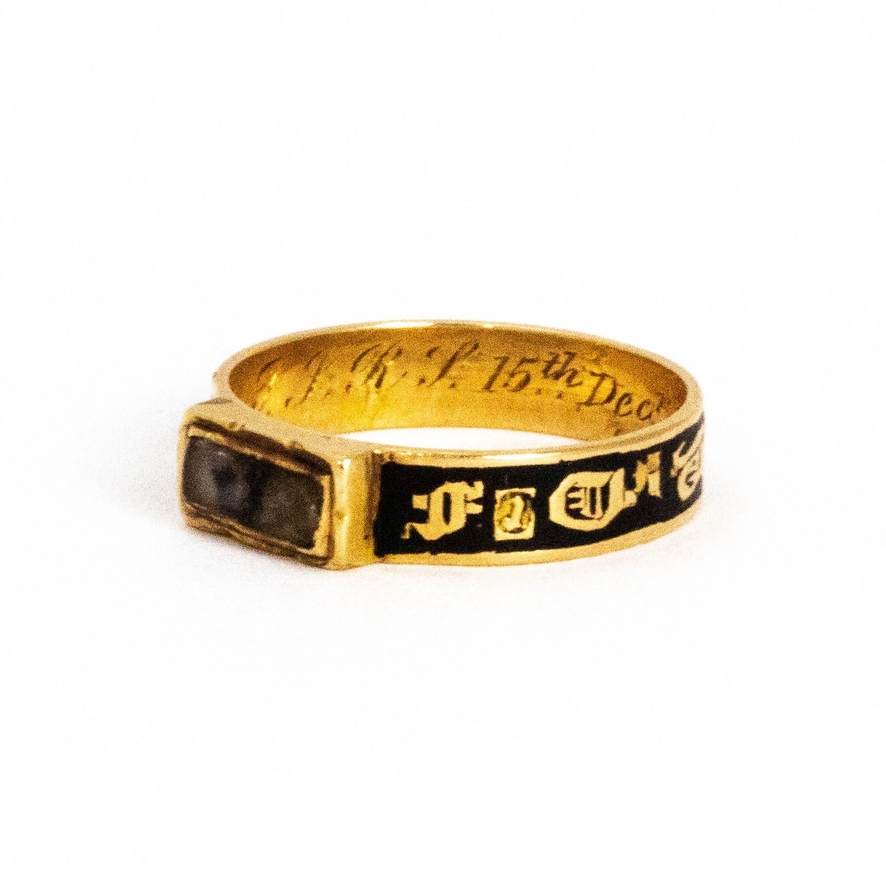 What a wonderful example of a Victorian mourning ring this is! The ring is modelled out of 18ct gold and black enamel and features a glazed locket front. The inner of the ring is engraved, reading 