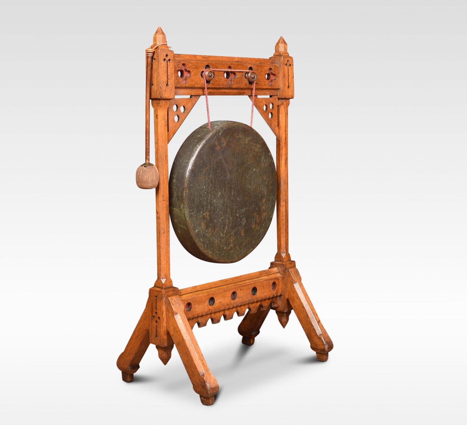 Mid-Victorian gothic revival dinner gong, in the style of Bruce Talbert. With oak frame, brass gong and original beater.
Dimensions
Height 42 inches
Width 24 inches
Depth 15.5 inches.