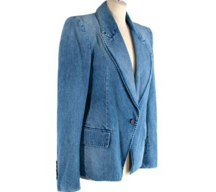 Tom Ford Mid Wash Denim Jacket 
 
 - Retro inspired silhouette with peak lapel and single breast cut
 - Single button fastening
 - Sharply tailored with formed shoulders and cinched waist
 - Long sleeve, button finished cuffs
 - Decorative flapped