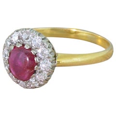 Midcentury 0.65 Carat Cabochon Ruby and Old Cut Diamond Cluster Ring