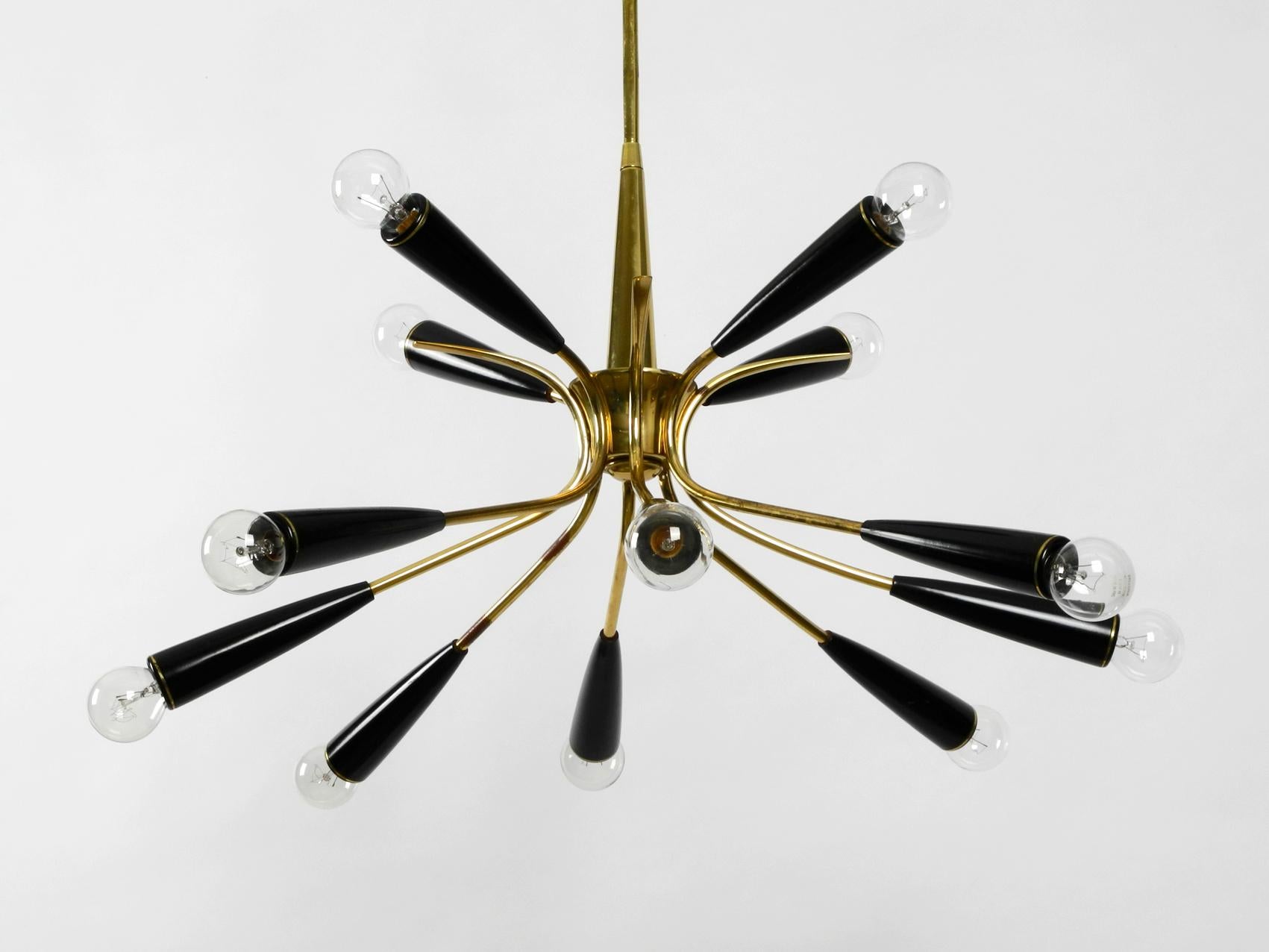 Midcentury 12 Armed Sputnik Brass Ceiling Lamp with Cones Made of Bakalite In Good Condition In München, DE