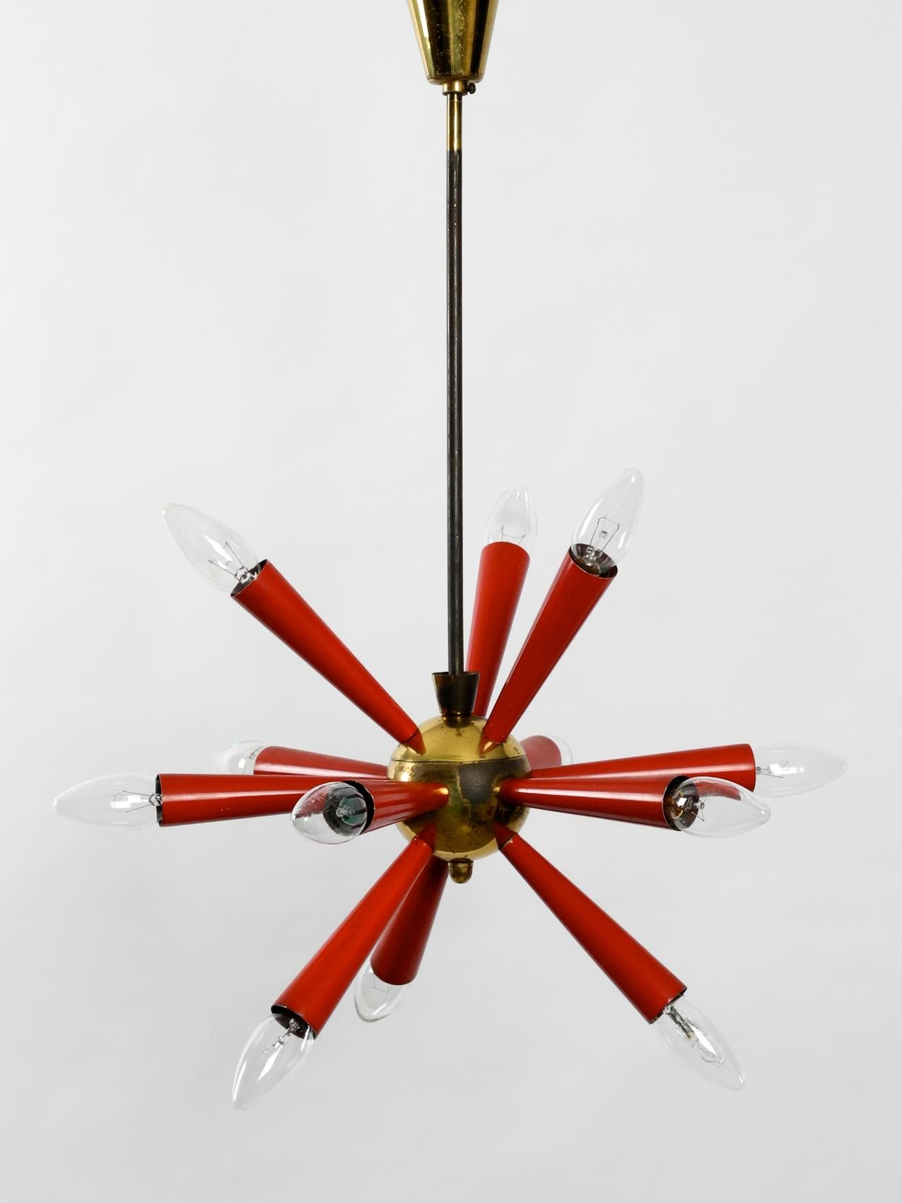 German Midcentury 12-Armed Sputnik Ceiling Lamp Made of Brass and Red Painted Metal