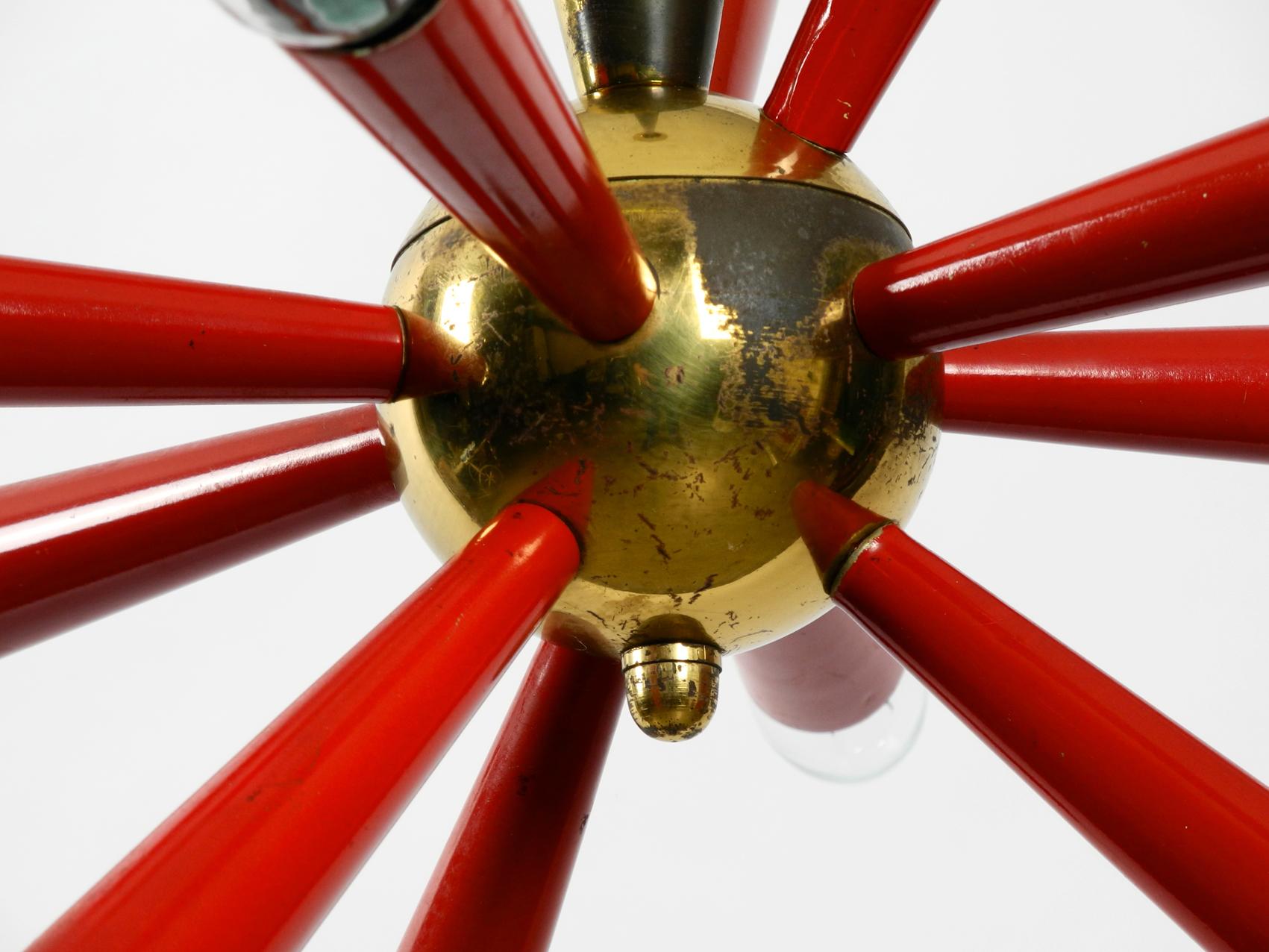 Mid-20th Century Midcentury 12-Armed Sputnik Ceiling Lamp Made of Brass and Red Painted Metal