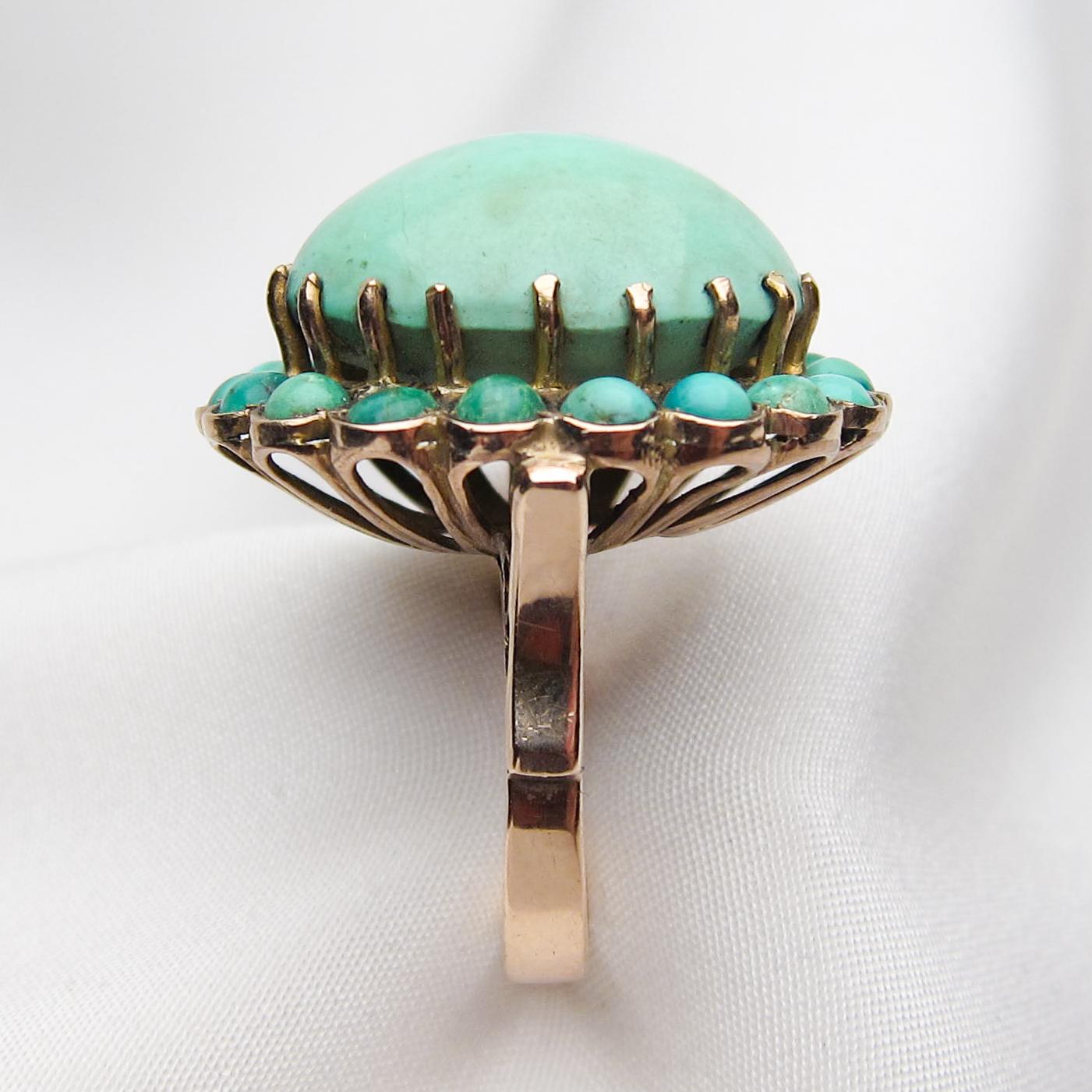 Midcentury 14 Karat Gold 26.86 Carat Turquoise Cabochon Halo Cocktail Ring In Good Condition For Sale In Seattle, WA