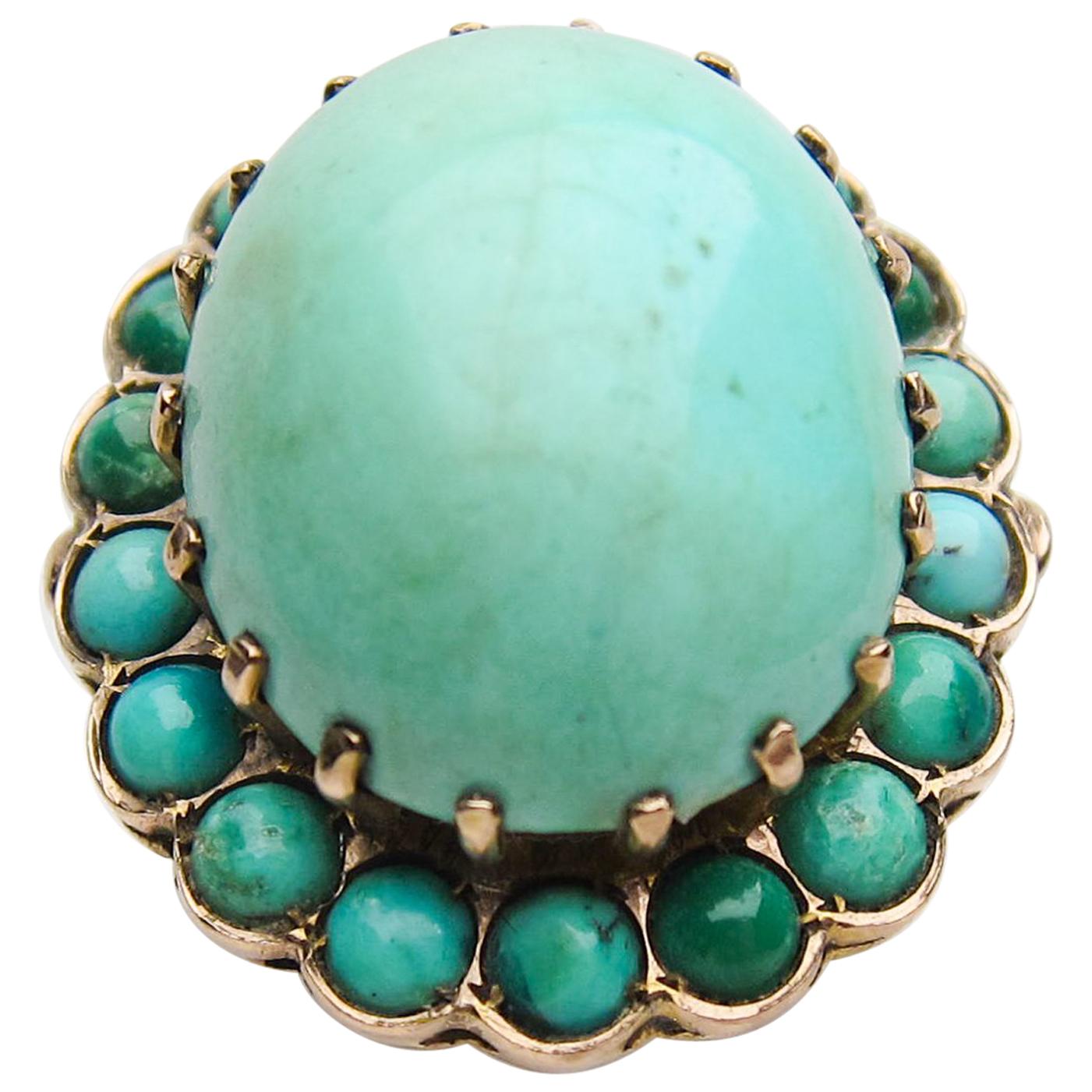 Midcentury 14 Karat Gold 26.86 Carat Turquoise Cabochon Halo Cocktail Ring For Sale