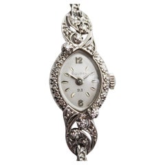 Montre Bulova du milieu du siècle en or blanc 14 carats avec diamants en forme de corde, 23 carats