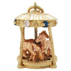 Mid-Century 14 Karat Yellow Gold Sapphire Diamond Movable Carousel Pendant