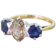 Midcentury 1.46 Carat Fancy Intense Brown Diamond and Sapphire Trilogy Ring