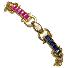 Midcentury 18 Karat Yellow Gold Link Ruby, Sapphire and Diamond Bracelet