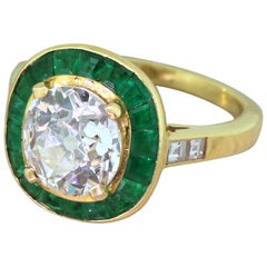 Midcentury 1.91 Carat Old Cut Diamond and Emerald 18 Karat Gold Halo Ring