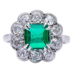 Vintage Midcentury, 1940s 18 Carat White Gold Colombian Emerald and Diamond Cluster Ring
