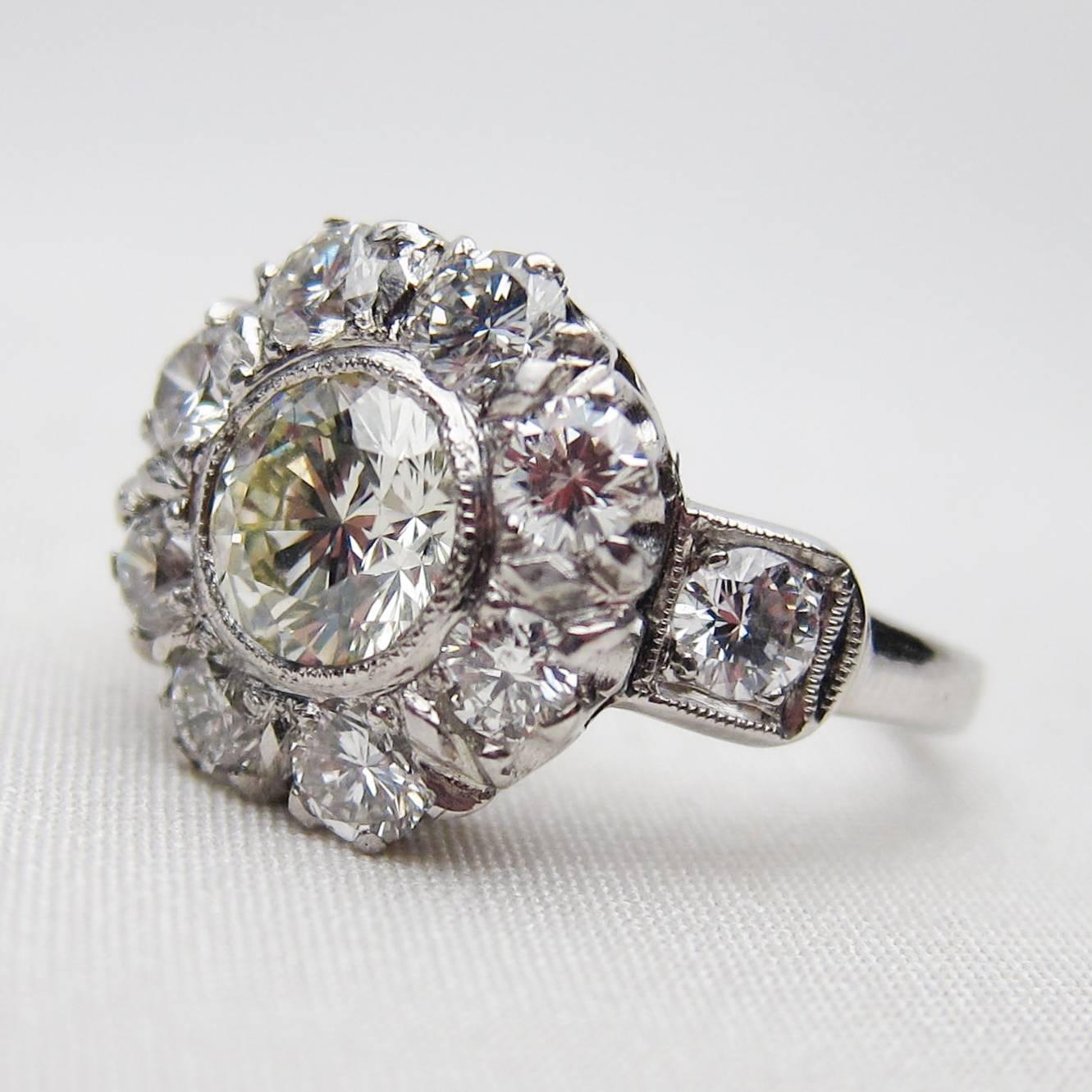 Women's Midcentury 2.64 Carat Brilliant-Cut Diamond and Platinum Cluster Engagement Ring For Sale