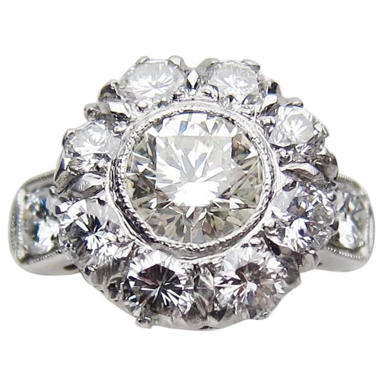 Midcentury 2.64 Carat Brilliant-Cut Diamond and Platinum Cluster Engagement Ring For Sale