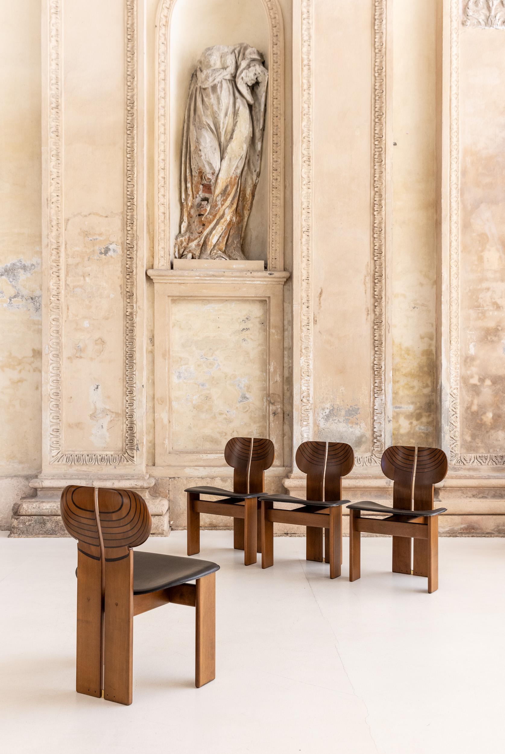 Iconic set of 4 Africa chairs designed by Afra e Tobia Scarpa for Maxalto.
The chairs are in excellent condition , wood marked Maxalto in the back and leather in excellent condition too.
They can match with its dining table.
Bibl G. Gramigna,