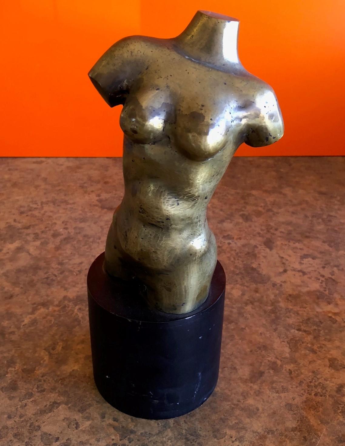 Midcentury abstract bronze nude on black metal base sculpture by Ken California listed artist Ken Vares, circa 1960s. The piece is very heavy, well detailed and signed.