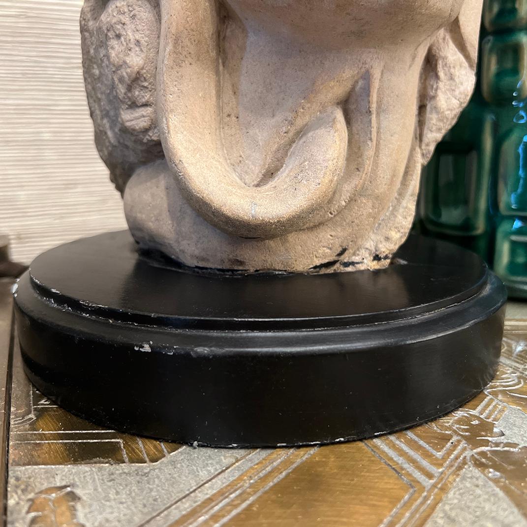 A circa 1970's Italian carved stone sculpture with wooden base.

Measurements:
Height: 15