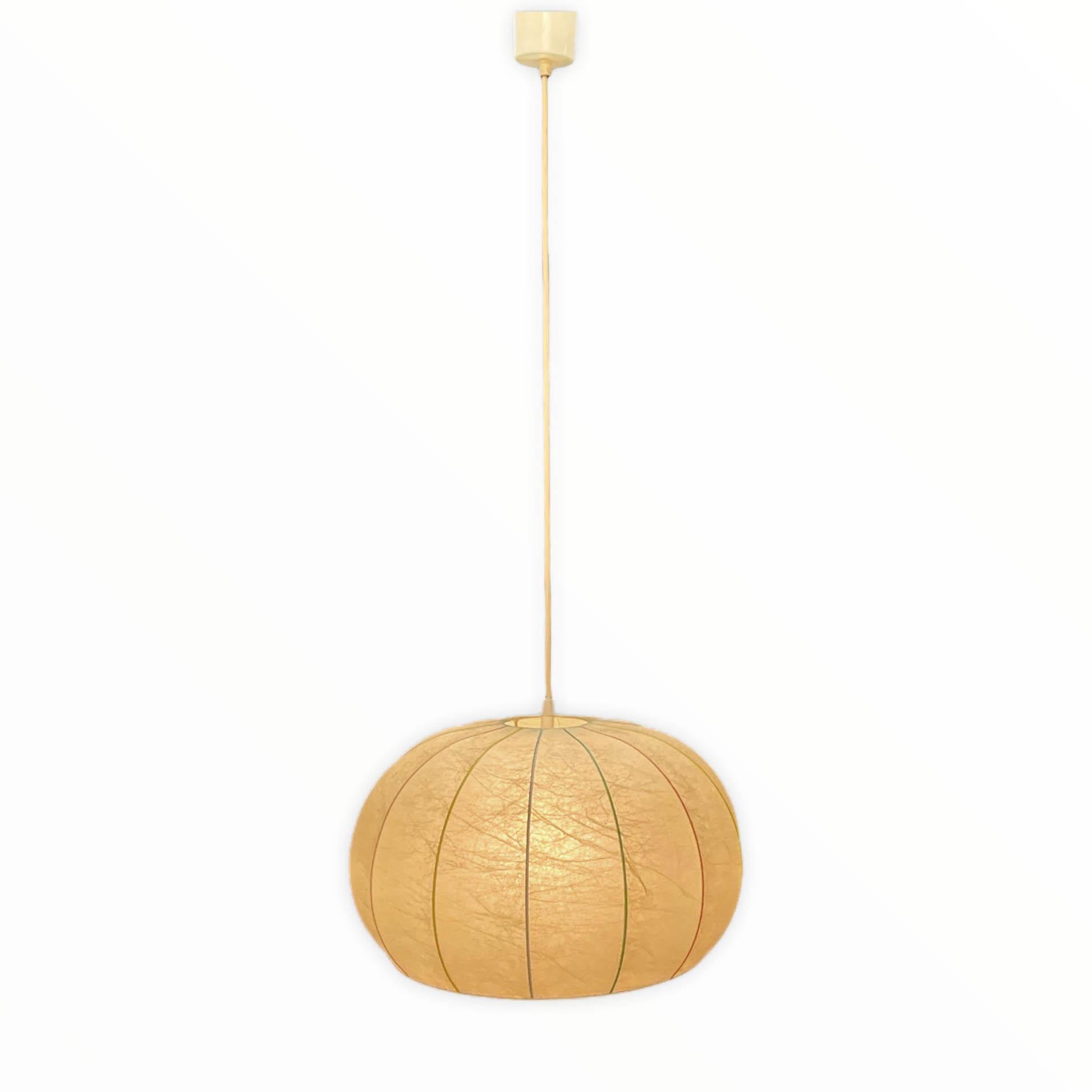 Incredible mid-century resin and metal 'Cocoon' chandelier. The metal structure is colored in yellow, red, green and blue. This wonderful pendant lamp was designed by Achille Castiglioni in Italy in the 1960s.

This fantastic piece features a