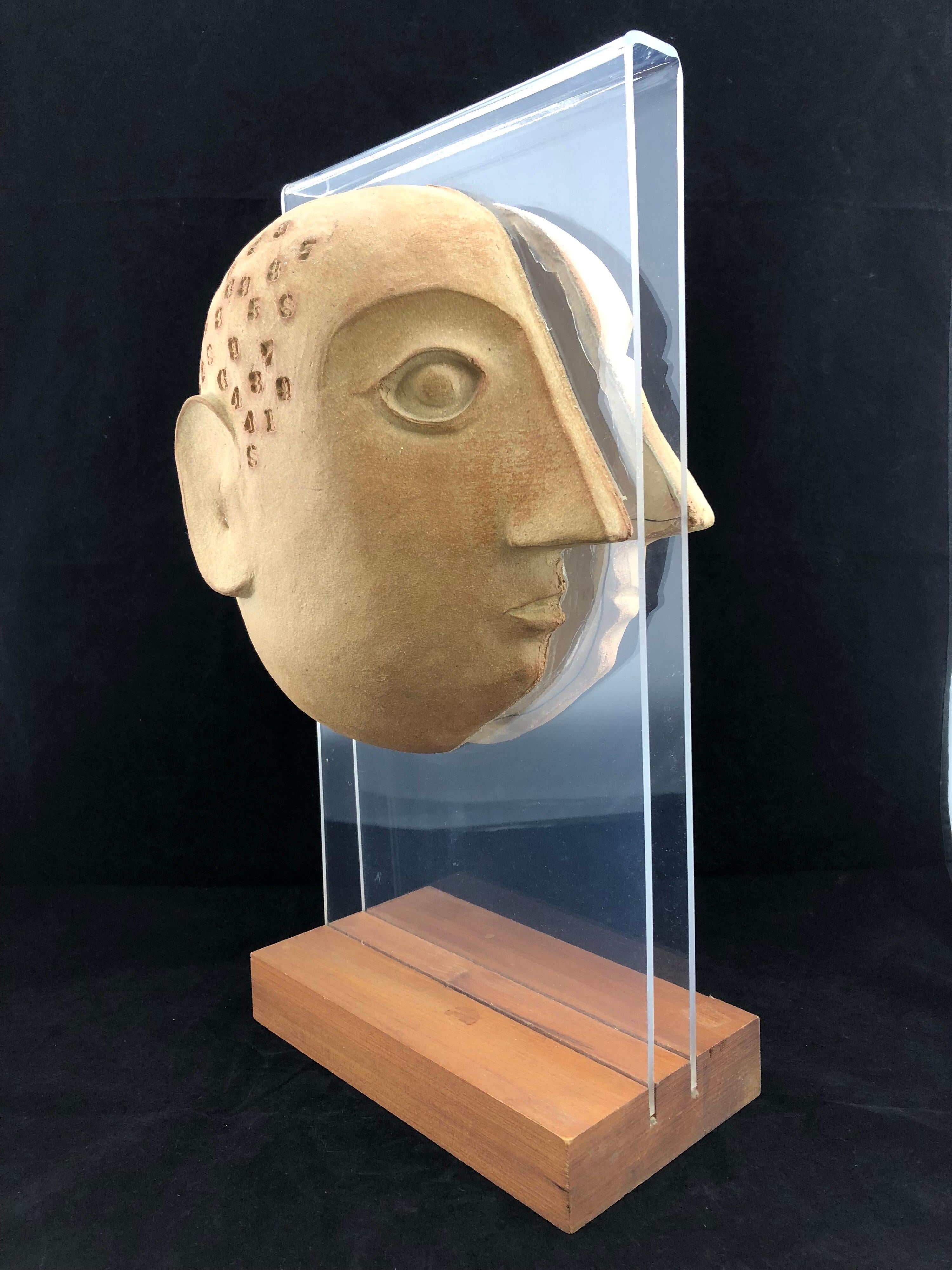 Midcentury acrylic and ceramic head sculpture by David Gil for Bennington. No known issues that would detract from value or aesthetics. Ready for use.