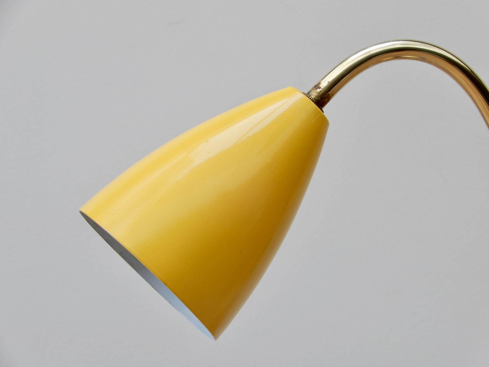 European Midcentury Adjustable Brass Table Lamp and Vide Poche with a Yellow Metal Shade For Sale