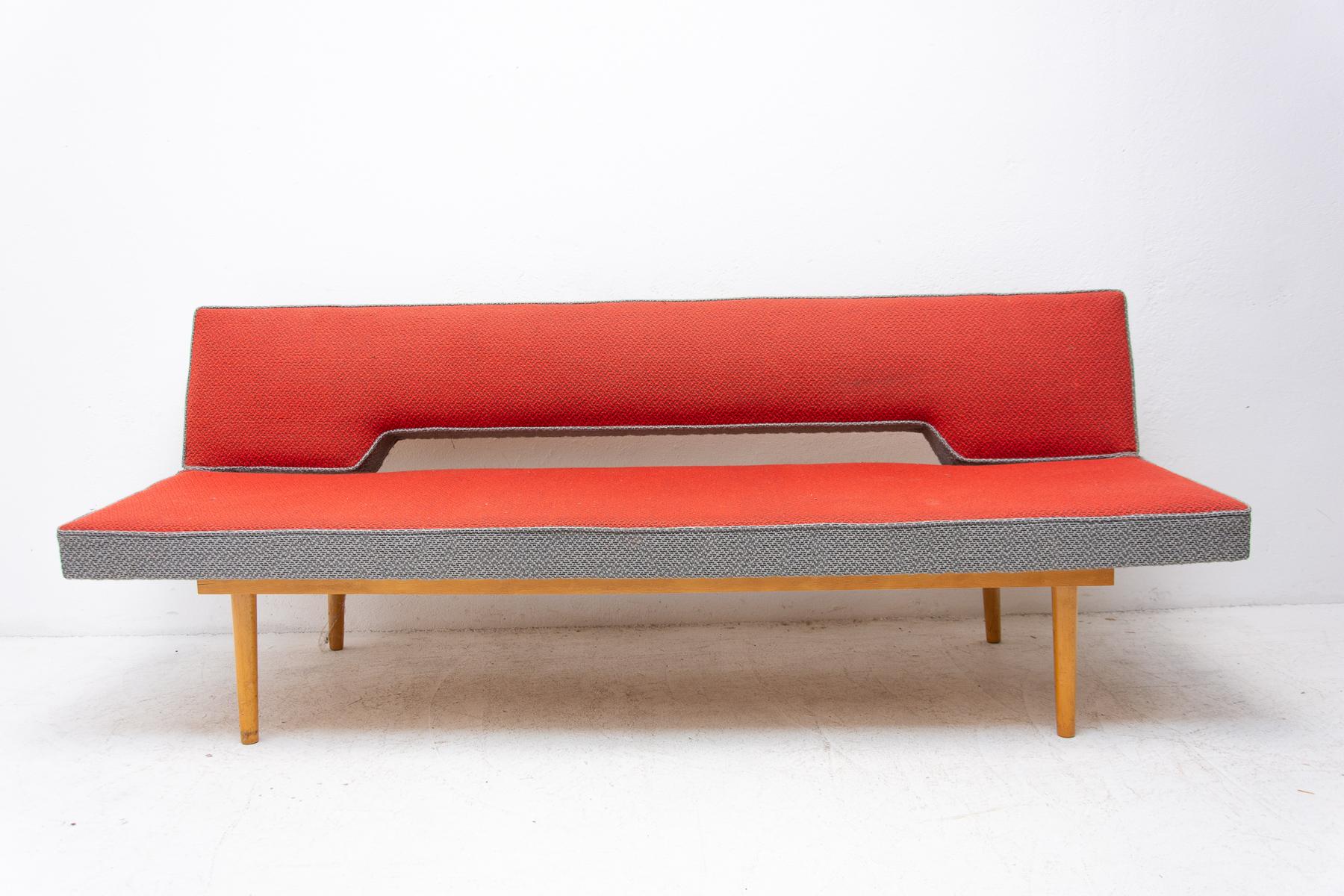 Midcentury adjustable sofa-bench designed by the Czech famous designer Miroslav Navrátil in the 1960s. Made in Czechoslovakia. It features wery attractive and simple design. Material: fabric, beechwood. It´s a typical example of Czechoslovak design