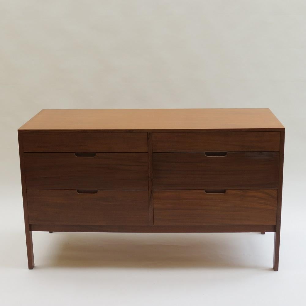 A very good quality mid-century chest of drawers, designed by Richard Hornby and produced by Fyne Ladye of Banbury UK in the 1960s.
Made from Afrormosia with solid Afrormosia drawer fronts and Brazilian Mahogany drawer linings and recessed handles.