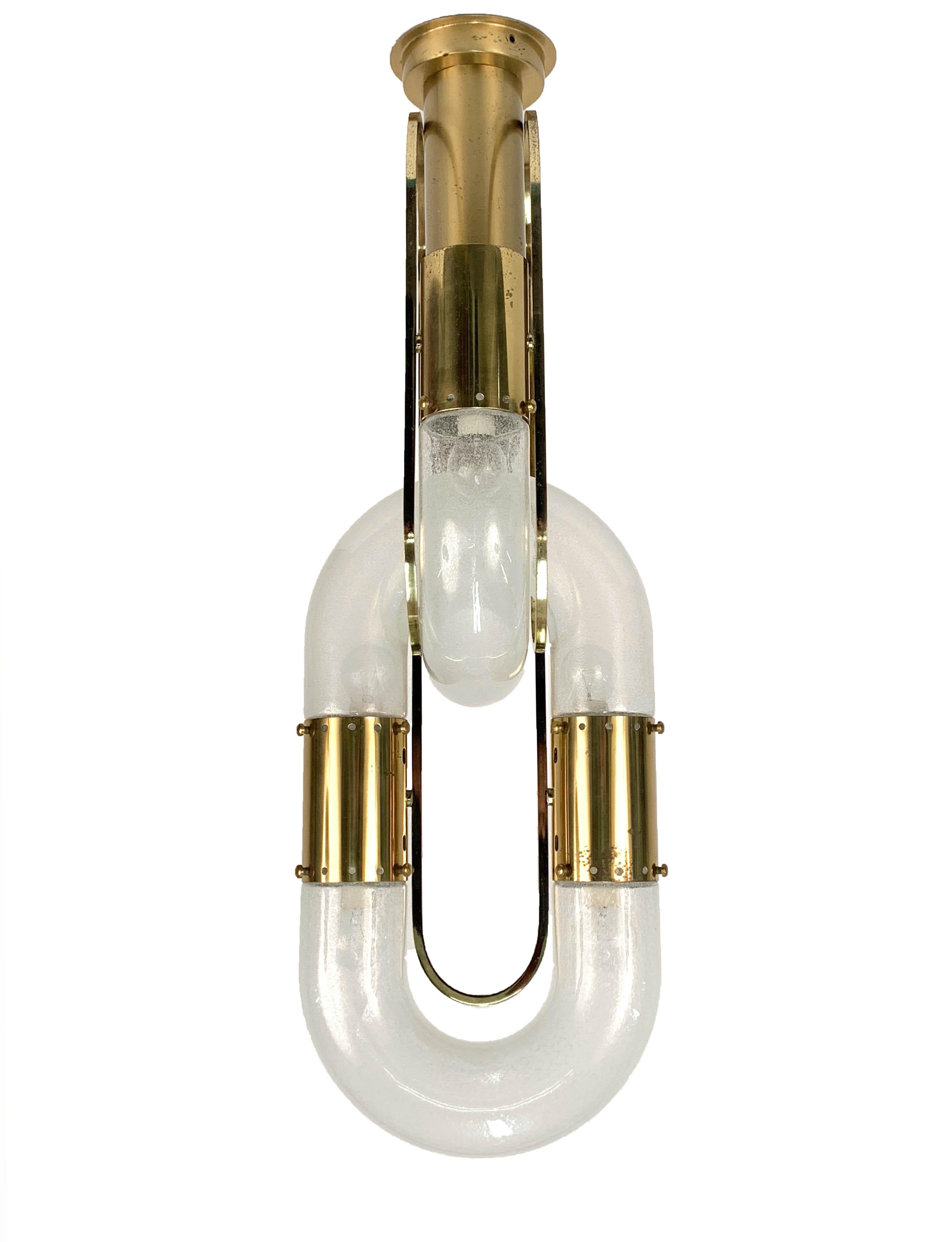 Unique midcentury brass and frosted Murano glass chandelier. Designed by Aldo Nason for a Mazzega Italian production of the 1970s.

The elegant lines of the two main elements are crossed like links of a chain. The item can be used as a chandelier
