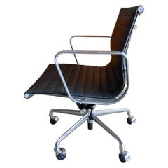 Midcentury Aluminum Group Chairs in Black Leather Near New Old Stock