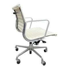 Midcentury Aluminum Group Chairs in White Leather 
Two Available