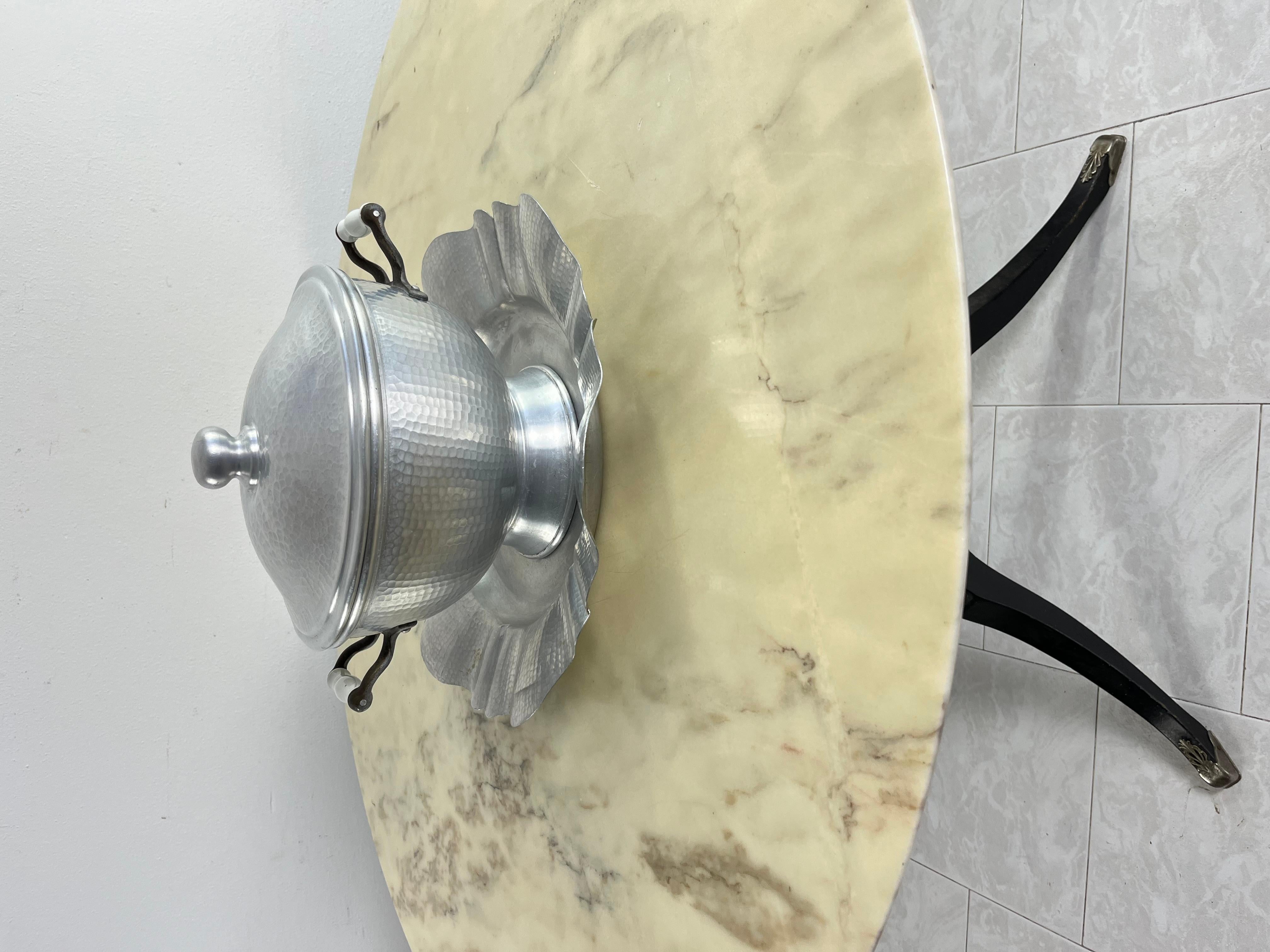 Midcentury aluminum soup tureen with porcelain handles 1930s
The plate has a diameter of 41 cm. The tureen is 27 cm (37 cm including the handles) and is 22 cm high.
Intact and in good condition, small signs of aging. Found in a noble villa in my