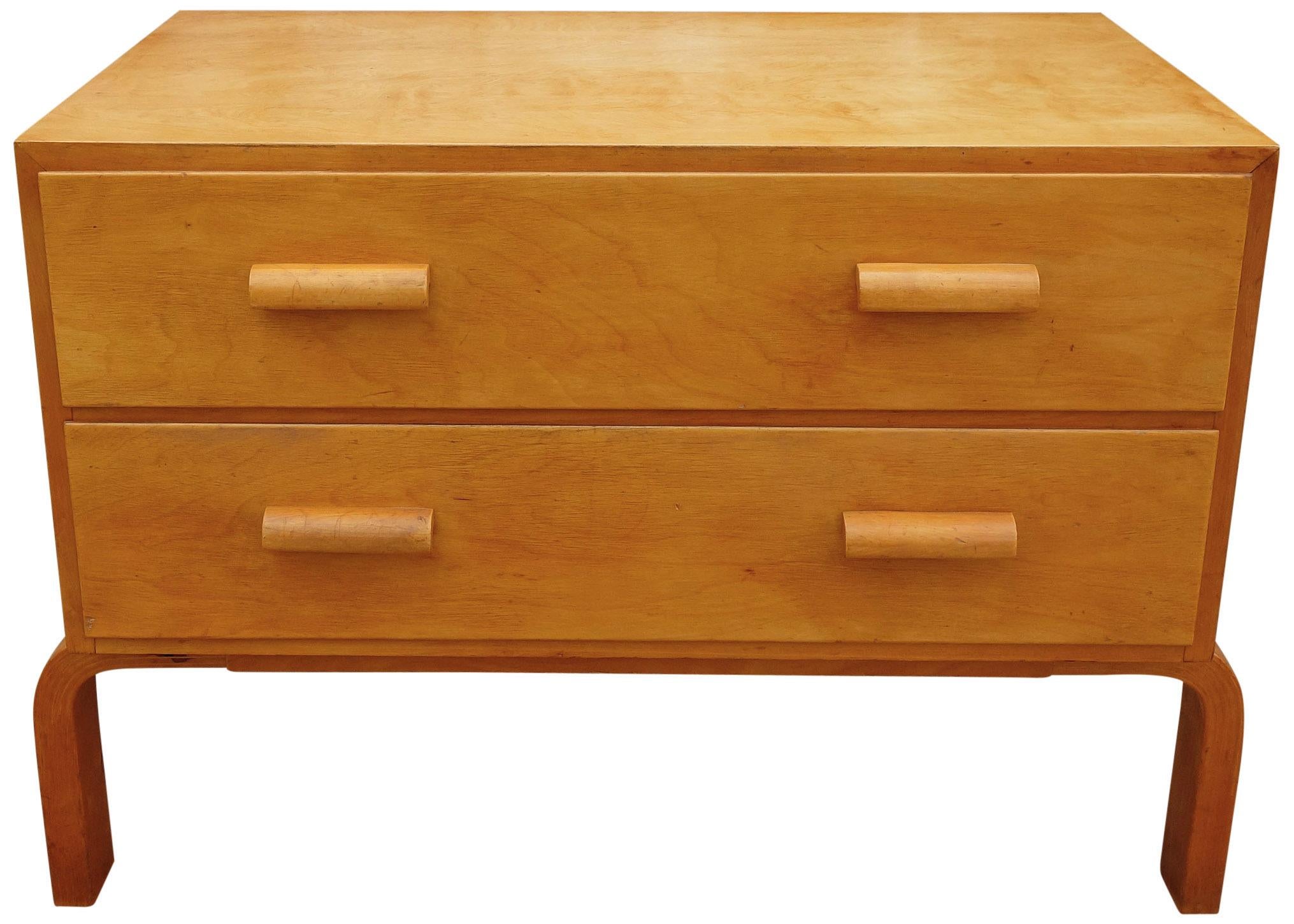 Incredibly rare and early two drawer dresser or sideboard by Finnish architect and designer Alvar Allto. Can equally be used as a night stand or end table given its size. In all original condition displaying wonderful patina and appropriate wear