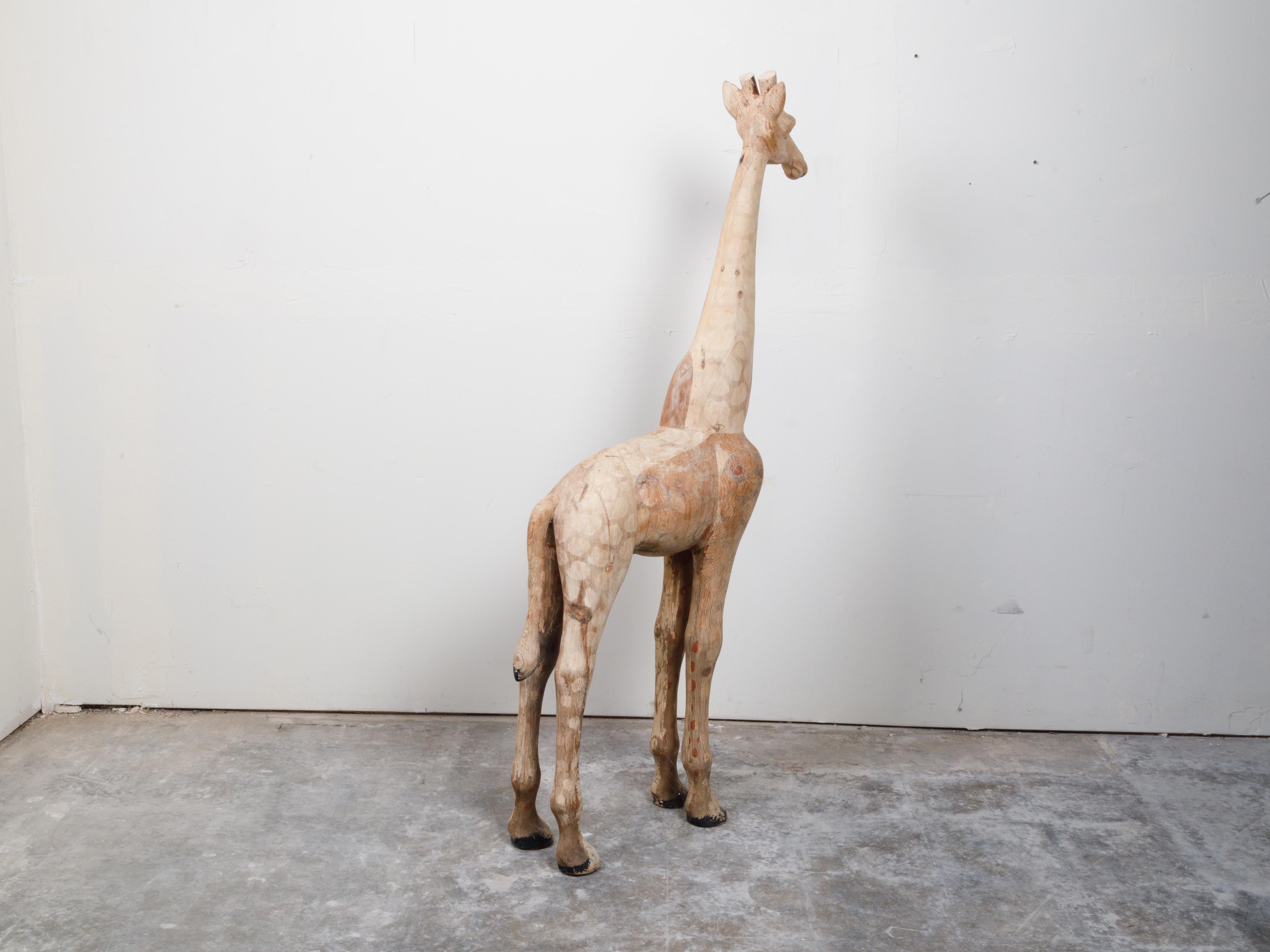 Mid-Century American Carved Wooden Giraffe Sculpture with Natural Finish In Good Condition For Sale In Atlanta, GA