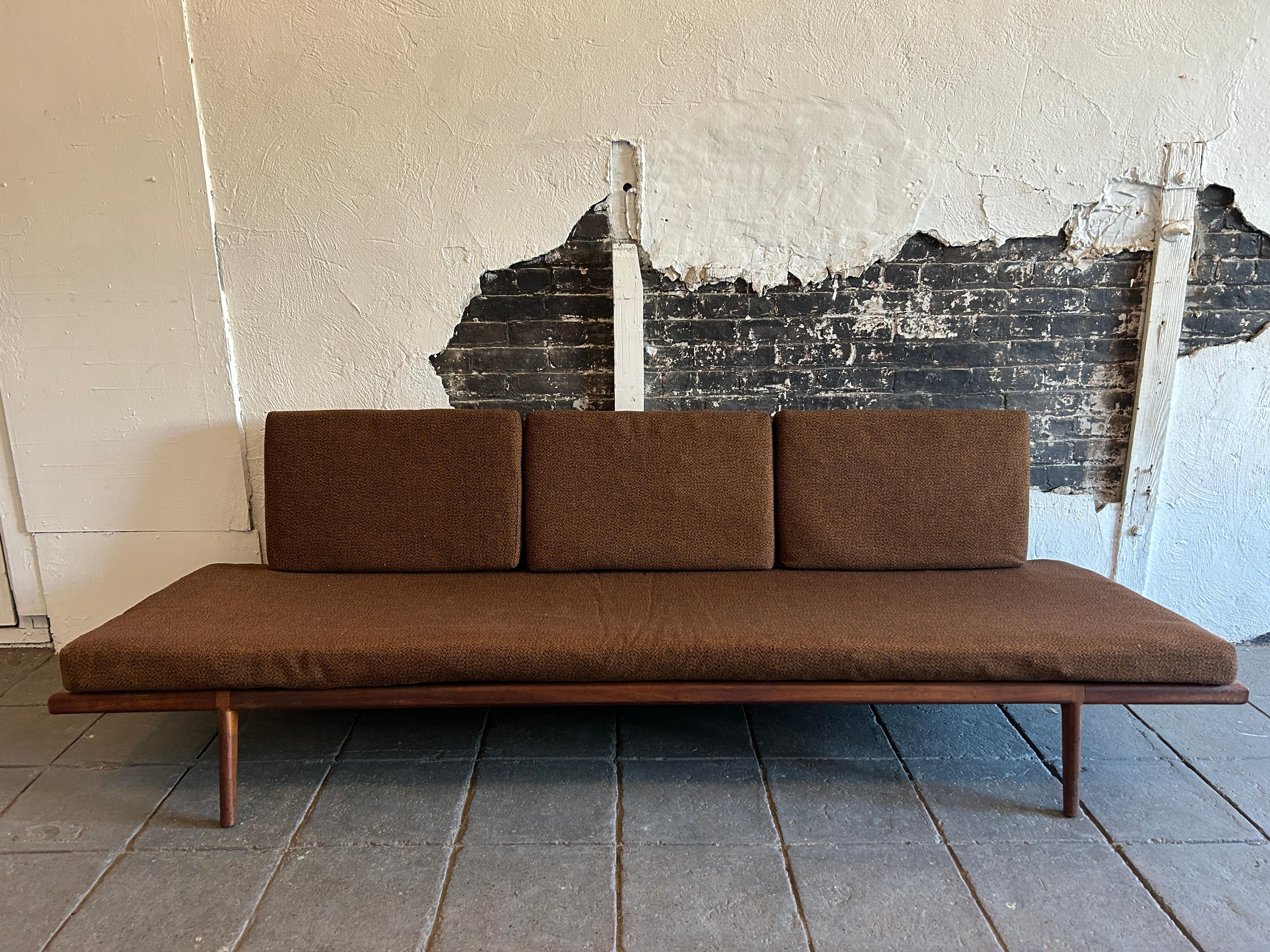 Stunning midcentury American Modern Mel Smilow Walnut frame long low sofa or daybed. Beautiful armless sofa with solid walnut sculpted frame and steel spring support insert. Has Original upholstery and foam would highly recommend new upholstery or