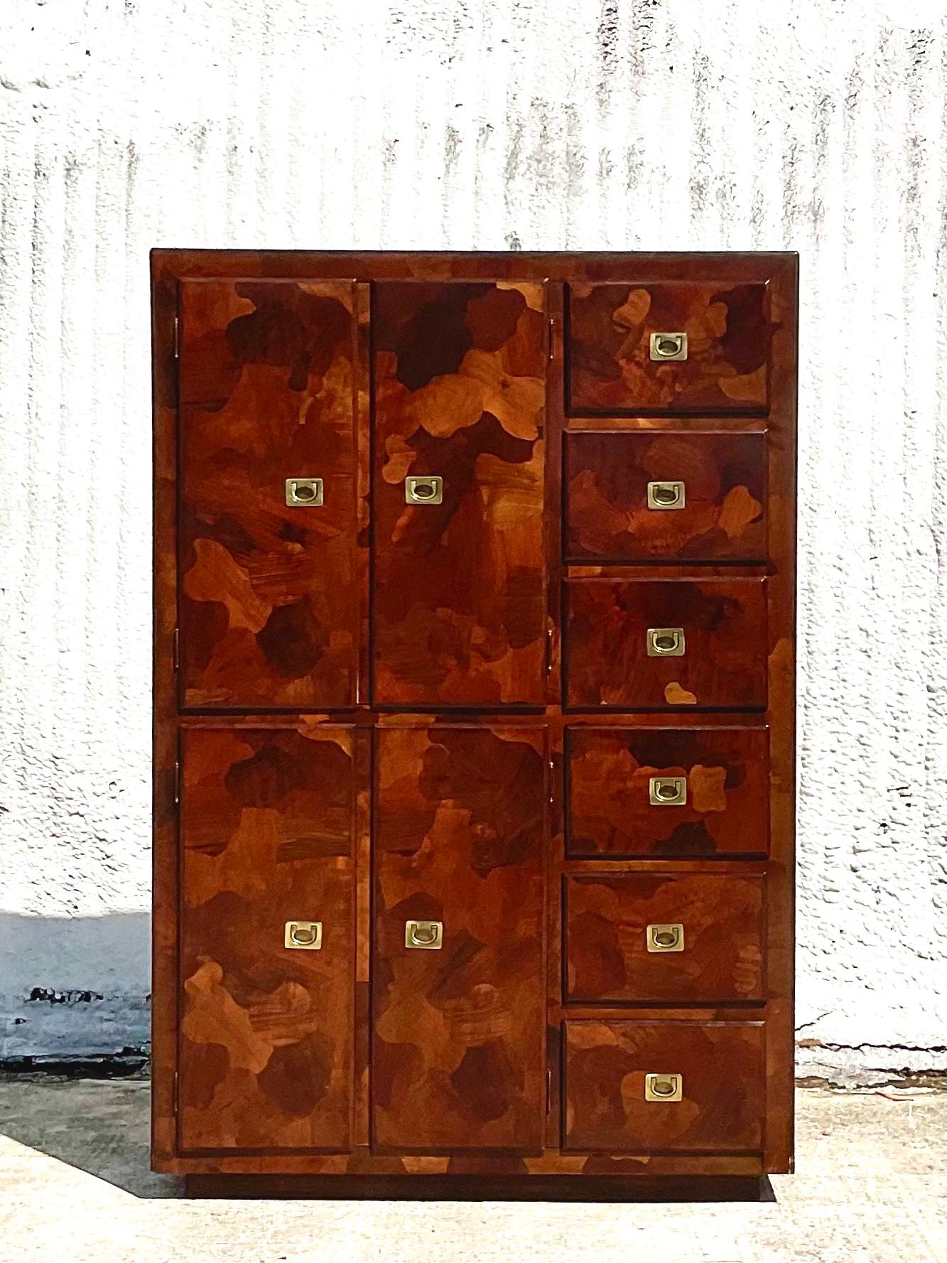 Fantastic vintage Midcentury Gentlemen’s chest. Made by the iconic American of Martinsville. Beautiful patchwork Olive Wood give these a distinctive look. Beautiful brass hardware.